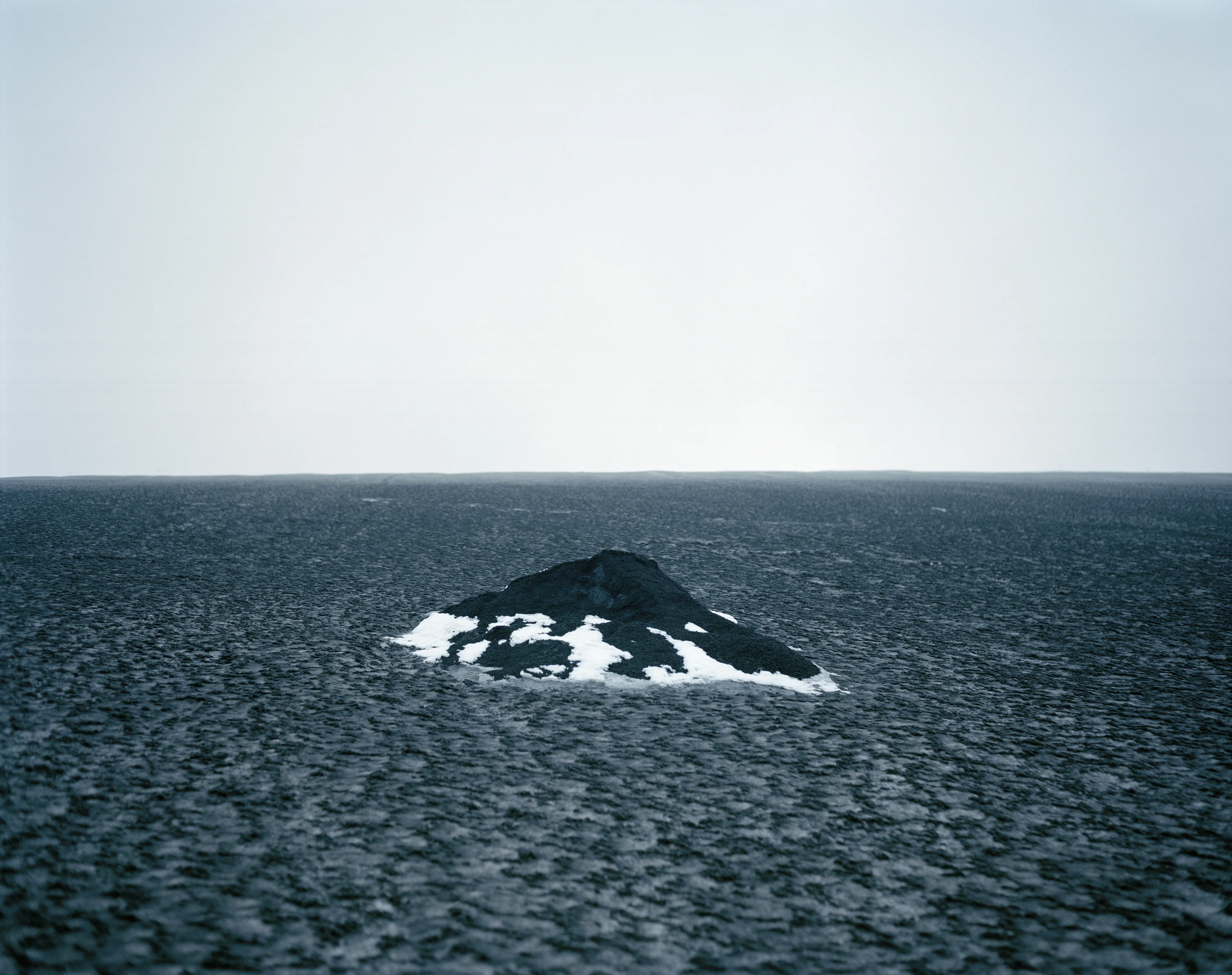 Polaris is a meditation on otherworldly encounters in the Circumpolar Northern landscape. At once an inward and outward exploration, the images reflect my childhood perception of the natural world: a realm of wonder, mystery, and sometimes magic.

To me, nature is the source of spiritual well-being, and making
photographs is a way to connect with that source. These images reconstruct a childhood mythology in the boreal Alaskan landscape, where I was raised. The series explores the affinities
between Iceland and the Alaskan Arctic; distant regions connected by climate, remoteness, and
seismic activity. By traversing the landscape on foot in a receptive state of mind, numinous experiences reveal themselves. Ice, weather, animals, and celestial phenomena take on significance, and our human scale in geologic time becomes clearer.

These images convey transcendent encounters, each imparting a sense of wonder in the presence of the unknown. Polaris, the North Star, functions as a metaphor for the presence I feel emanating from these places, the only constant in environments that are otherwise in constant flux.