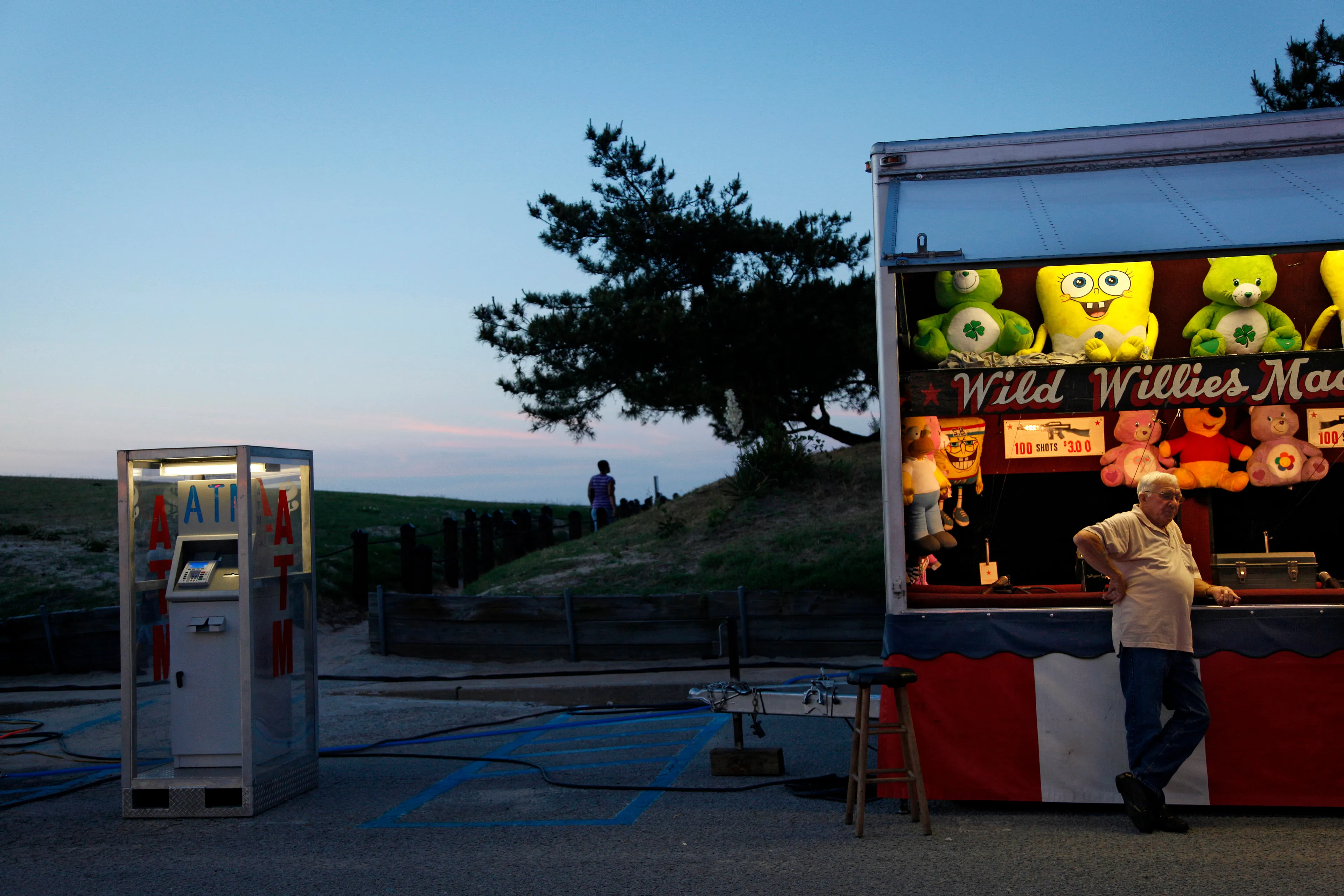Between the Devil and the Deep Blue Sea is a visual essay about the changing character of a working-class seaside community located along the Chesapeake Bay in Virginia. The work explores residents' relationship to the natural environment and an American neighborhood that has become an intersection of class.