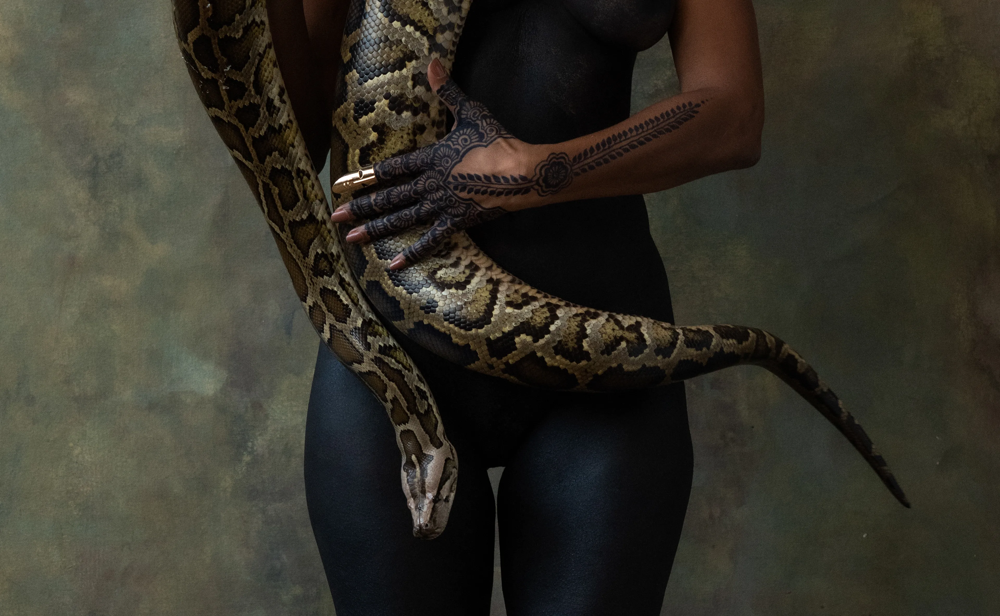 For centuries, the art world was seen through the eyes of a small few who, under a patriarchal society, chose the aesthetic and the narrative—and whose main depiction of the sacred female body was as an objectified and sexualized woman. 

Delphine Diallo aims to change this dynamic. Her intention is for every woman she photographs to feel the image she makes of them is a personal gift. “I am not taking pictures, I am giving pictures,” as Diallo puts it. By engaging in intimate conversations with her subjects, Delphine removes the sense of vulnerability that often comes with being photographed. Working with body painters and jewelry and mask makers, Diallo also uses traditional mythology and spiritual symbols to empower her subjects. Her portraiture is all about connection and exchange. She believes women are deep beings and connects with them on an emotional level. The French-Senegalese photographer spends more time speaking with her subjects than photographing them. 

Diallo’s photographs are never discriminating, yet deeply communicative, and portray women beyond judgment, soaking up their limitless beauty. Diallo's works are meant to encourage every woman to write a personal narrative, to take a stand, to have a firm voice. No preparatory models, sketches, or plans lay behind her photographs, which depict only outstanding feminine painted bodies. It is all a part of the vision flowing out of the artist's mind, grounded in her right brain hemisphere, predominant in her energetic and vibrant personality. 

Drawing elements from eastern mythology and philosophy, whilst always ennobling and empowering women, her practice is reminiscent of Oriental 19th-century painting. Looking at Krishnamurti, Frantz Fanon, Joseph Campbell, Bruce Lee, Aimé Césaire, and A.D. Wilson as deep inspirational sources, her photographs raise awareness, appealing to all women to awaken their senses. Diallo immerses herself in the realm of the feminine universe and her eloquent portraiture technique unveils and stirs unexplored emotion and insight meant to reach beyond appearances. 

“We are in constant search for wonder and growth. I see art as a vessel to express consciousness and as an access to diffuse wisdom, enlightenment, fear, beauty, ugliness, mystery, faith, strength, fearlessness, and universal matter”.

Artist: Delphine Diallo
Series: Mother Earth
Date: