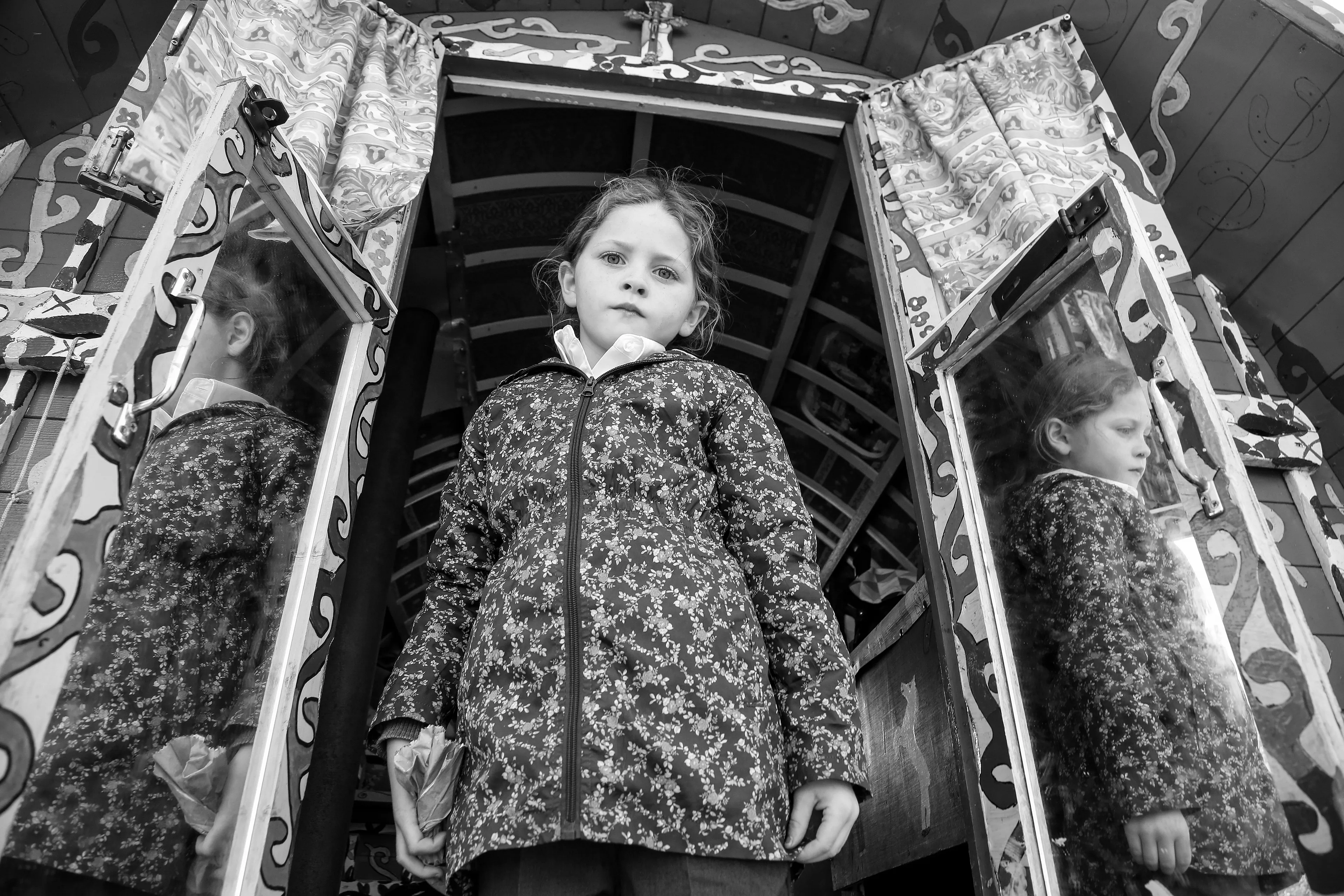 "I have spent my entire career photographing children all over the world. The last several years I have focused my eyes on the Irish Traveller that live in caravans on the side of the road or in open fields throughout Ireland.

The Traveller community are an Irish nomadic indigenous ethnic minority. There is no recorded date as to when Travellers first came to Ireland. This is lost to history but Travellers have been recorded to exist in Ireland as far back as history is recorded. Even with their great history they live as outsiders to society and face unbelievable racism growing up. As a mother of two daughters I became so interested in the culture and traditions and lives of these children. I have spent many years traveling back and forth to Ireland to document these incredible children."