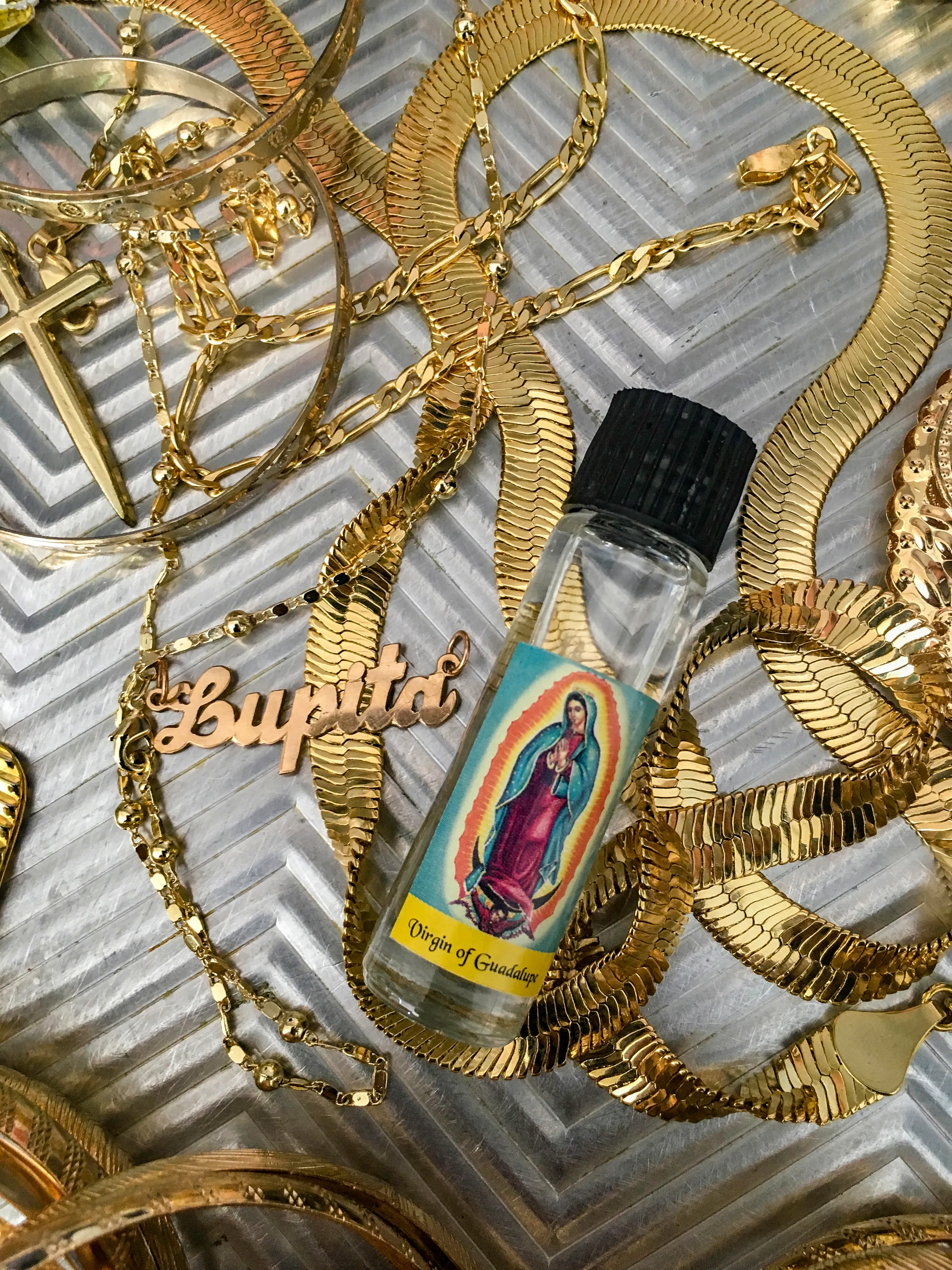 Guadalupe celebrates Mexico’s beloved patron saint, Our Lady of Guadalupe, while exploring the ways she has impacted my life. These images are a reinterpretation of Guadalupe’s symbolism which, for me, transcends their religious origin. Instead, this series is intended to honor the divine feminine energy, sacredness, and healing that Guadalupe's imagery can encapsulate for people of all genders and backgrounds. 

These photos explore topics such as womanhood, masculinity, and piety and ask, what does it mean to be divine? The project includes portraits of family and friends who share my affinity with Guadalupe, as well as images of apparitions found in various public places. I also created images that reimage Guadalupe in a contemporary context. Each is distinct, but serves one purpose - to connect people. 

Date: 2018