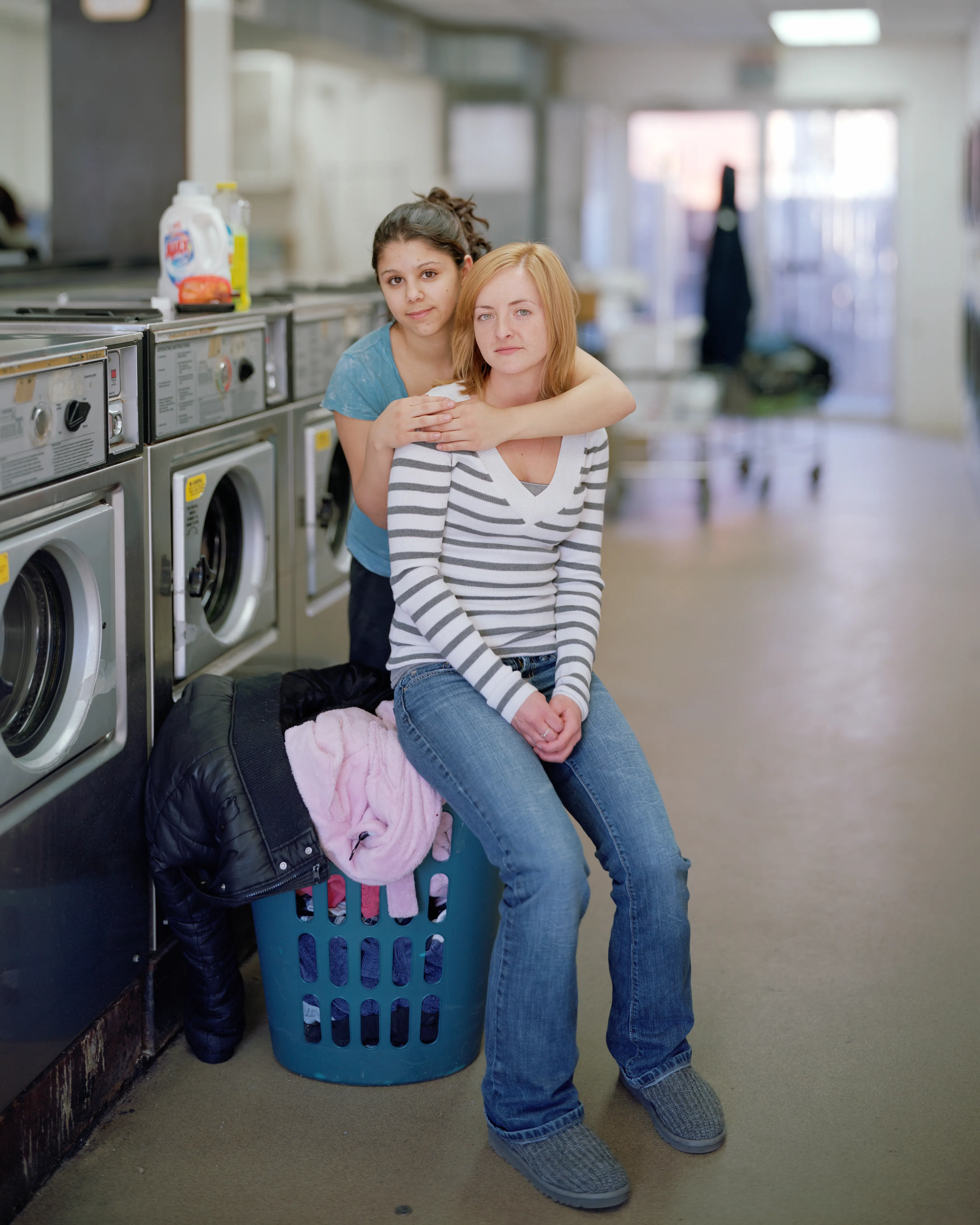 Richard Renaldi’s Touching Strangers embodies the human desire to connect despite our differences. Renaldi directed strangers to pose in front of a large-format, 8-by-10-inch view camera in towns and cities all over the United States. These startlingly intimate portraits reveal “humanity as it could be as most of us wish it would be and as it was, at least for those one fleeting moments in time.” These relationships may have only lasted for one moment, but the resulting photographs are moving and provocative, and continue to raise profound questions about the possibilities for breaking down social barriers with positive human connection in a diverse society.

#9