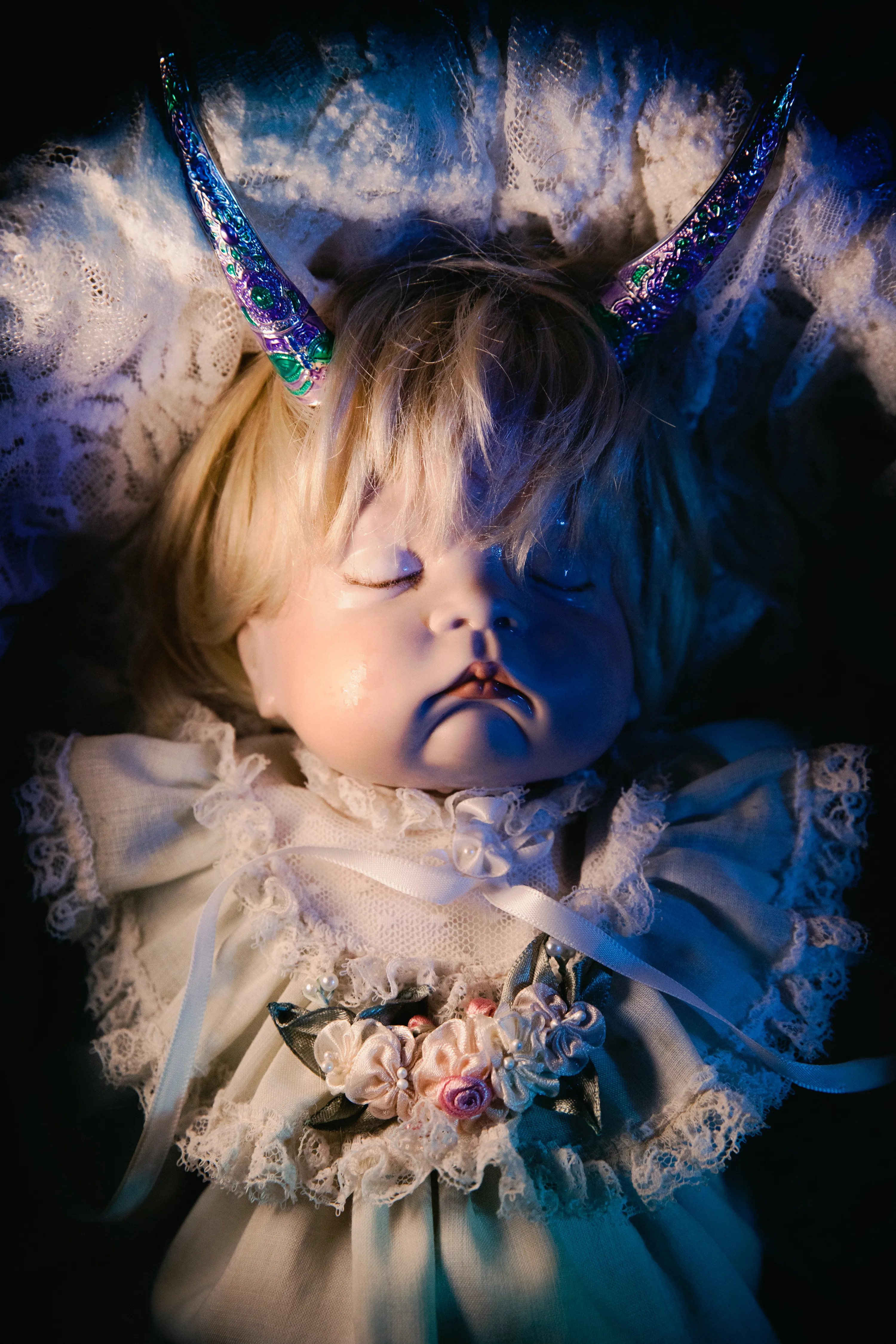 In their essence, dolls are simultaneously fascinating and controversial. Dolls are known to influence the construction of identities and exploration of various narratives, and are associated with racist and misogynistic stereotypes. In his 1913 essay Dolls, poet Rainer Maria Rilke posits: “We found our orientation through the doll. We could gradually flow down into her and collect ourselves and recognize, although somewhat dimly, our new surrounding world”. We definitely do, and this continues throughout our life: dolls are interwoven into the fabric of our fantasy worlds. And in these worlds, why would dolls be limited to our projections and expectations of them and not be capable of even more than us, humans?

The dolls are here. They observe without affirming good or bad, offering themselves as objects for attachment of all kinds of fantasies. Your invitation to the afternoon doll play has arrived.