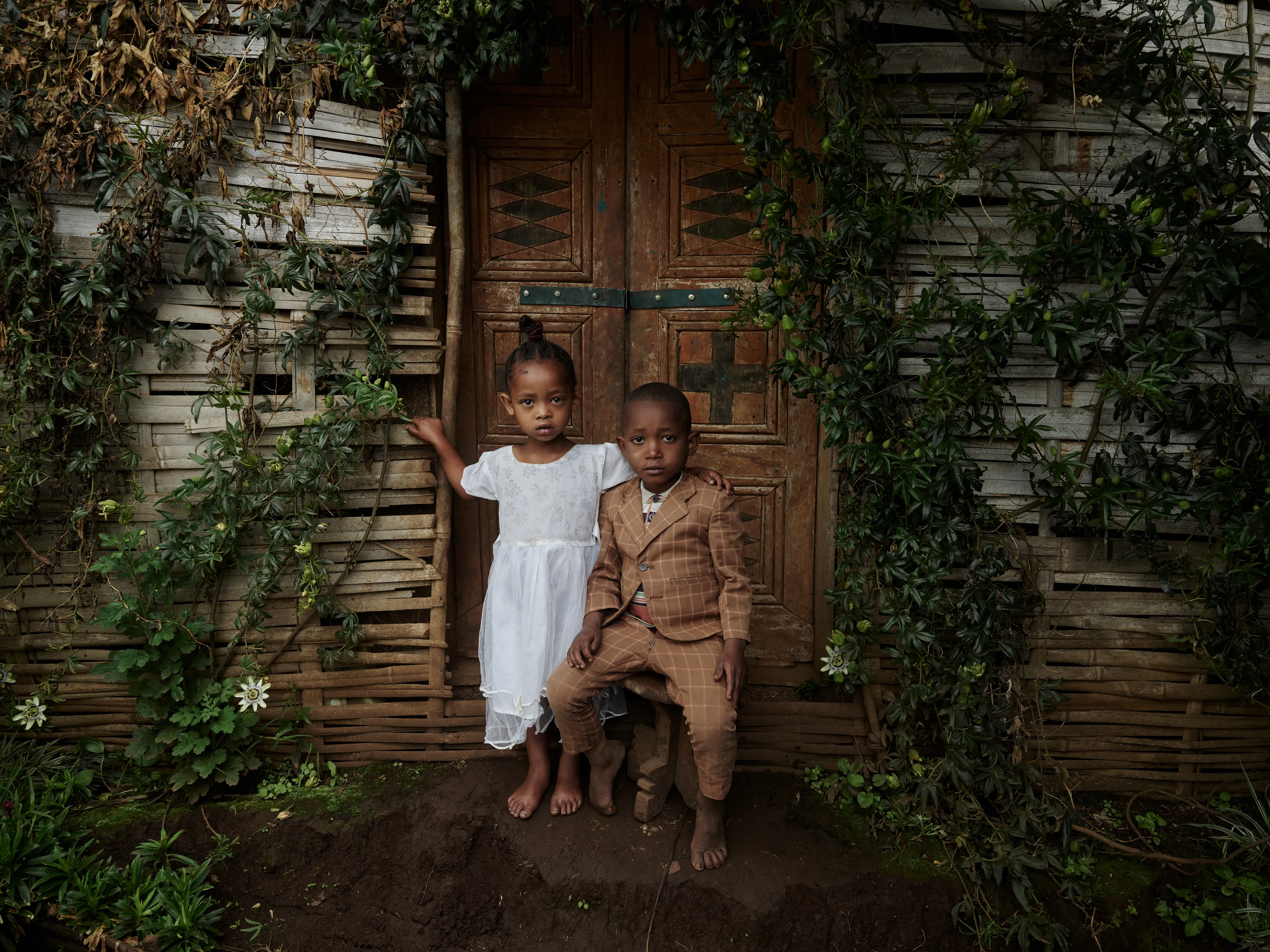 My life will forever be intertwined with Ethiopia. In my teenage days, this country is where I first found my vision as a photographer. Later, Ethiopia would be where I found my home and my soul mate. ETHIOPIA is a monolithic collection of my images captured over the course of thirteen years. It is an ode to every region of the country and a celebration of all the unique peoples found within. These seemingly disconnected cultural threads are woven together in a cohesive visual style in order to truly see Ethiopia— which itself is the sum of all the diverse lands and theproud people who inhabit it.

The dignified vision found in the portraits is not to obscure other searing
realities within Ethiopia, such as the wealth inequality and traumatic conflict
spread across the country. It is to highlight the prestige I have always
recognized here. This collection is about the timeless and pure things that
have withstood the politics of the day, and to challenge the way the outside
world can perceive this country. This is my tribute to the enduring Ethiopia.

The Kafa biosphere is one of UNESCO’s most prized and protected sites in Ethiopia. Kafa, Southern Nations, Nationalities, and People's Region, Ethiopia.

Location - Ethiopia Medium - digital capture Series - Ethiopia