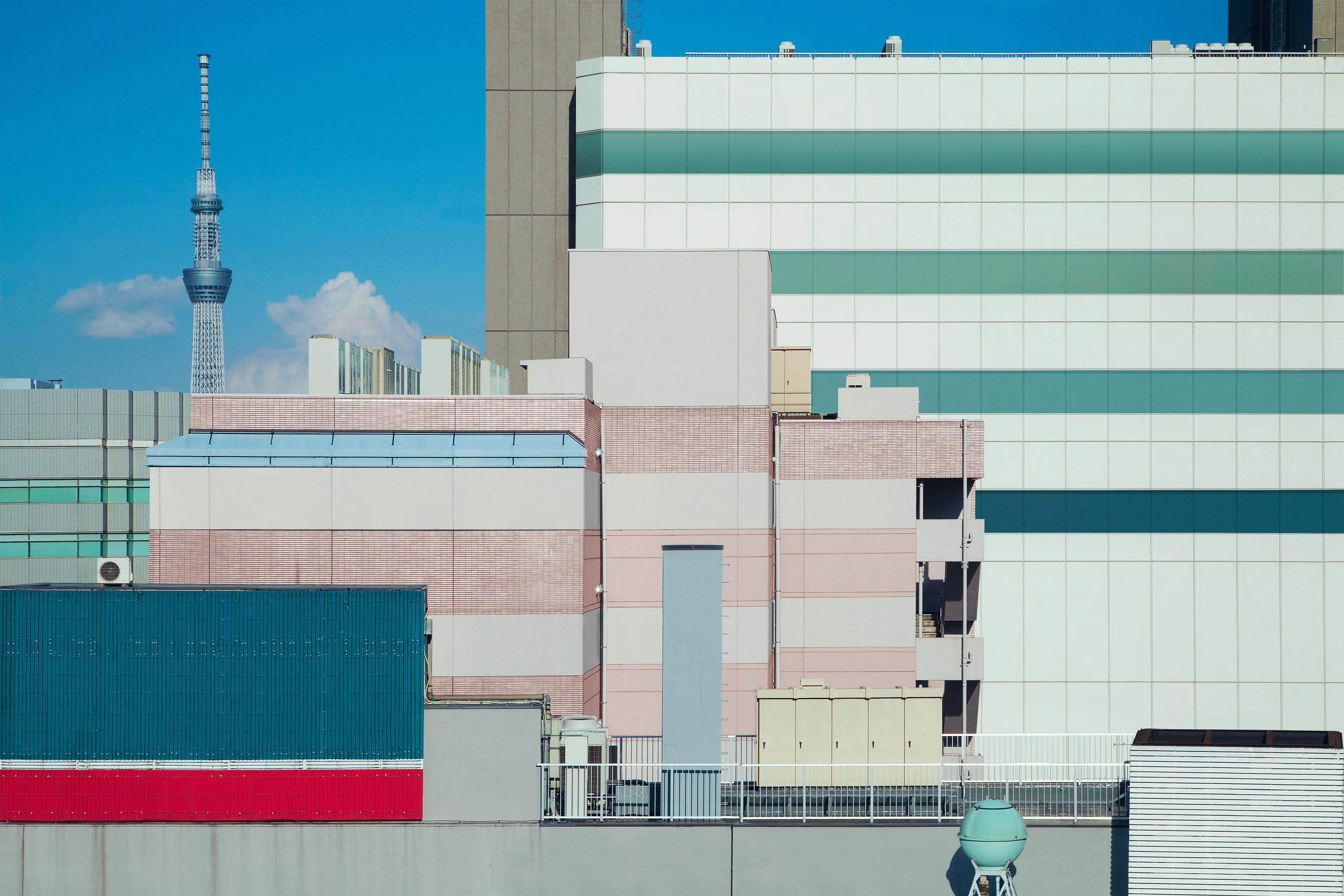 Tokyo Nude confronts the ever-changing outlines of the metropolis. As we discard the garments of civilization, is this dystopia or utopia?

Tokyo exists in a state of continuous renewal. The crowded buildings almost feel like forms deeply rooted forms, cemented into the city's fabric. Living in Tokyo, I exist symbiotically with these rigid forms. Conversely, the sense of community between people seems to be shifting into places unseen in public; mainly the Internet. Virtual connections have become more important than physical relationships with neighbors, thus shifting the historic ideals of "real life."

The outlines of Tokyo have become blurred. These works deal with my wonder for what this metropolis will look like when we no longer desire material functions. There are no entrances, no exits; a world filled with rectangular structures working their way into the horizon. All activity happens within the structures, and traces of consumption disappear from public view; a discarding of civilization's ideals, the garments and decorations.