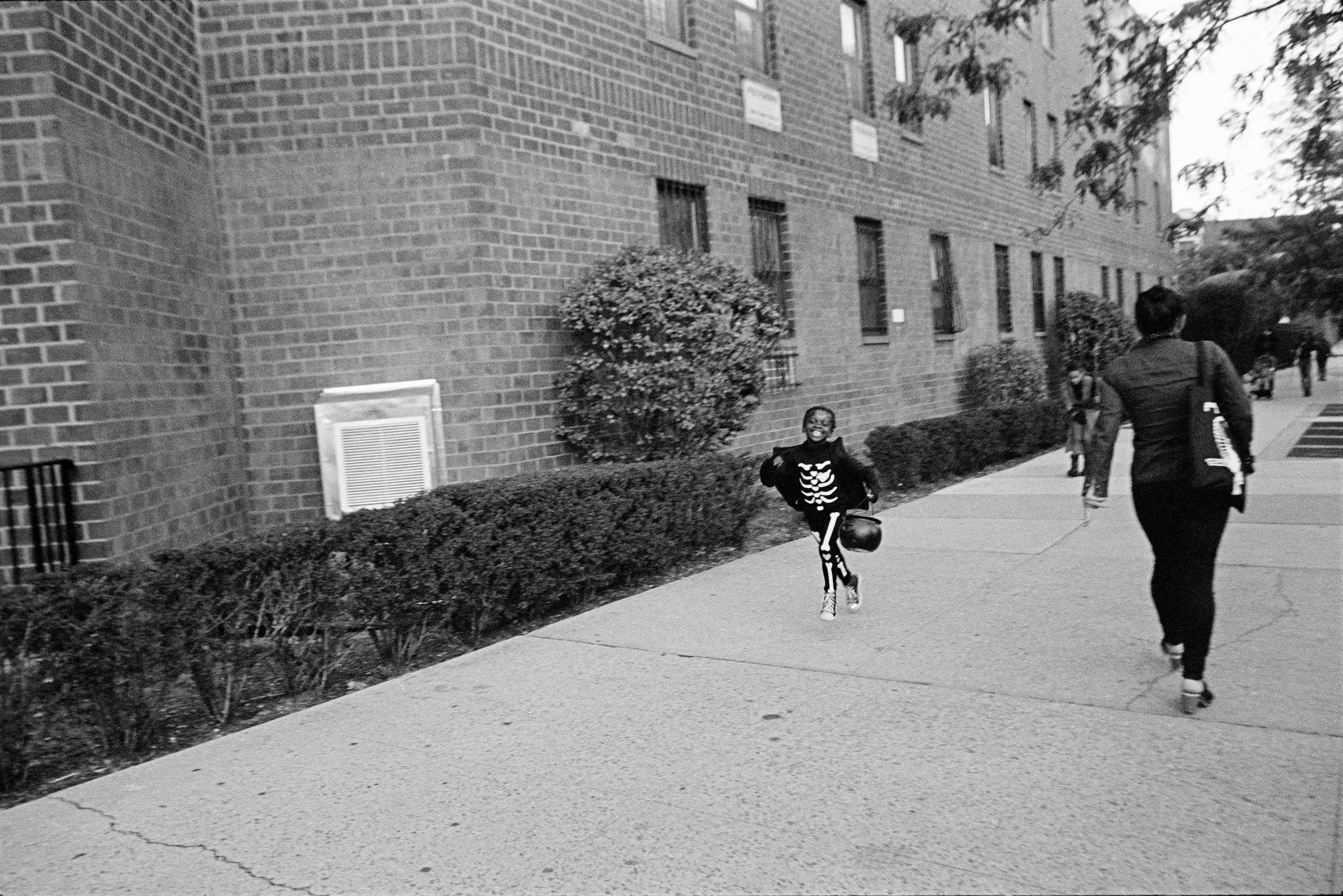 Inspired by the classic observer artists before him (al la Roy DeCarava, Garry Winogrand, and Robert Frank) Laurent Chevalier brings a modern spirit and informed sophistication to this collection of New York City photographs. This collection is a story of New York City, but it is specifically a story of Blackness. Spanning a period of 5 years and punctuated by poetry written by Brooklyn native Dr. Jamila Lysicott, Enough is a tangible exploration of the intersections of the Black experience. Through a lens of candid observation, Enough explores themes of patriotism, power, family and spirit. It does not seek to describe an experience holistically, but rather to present avenues that the viewer may choose and follow at will.

Medium: 35mm black and white negative