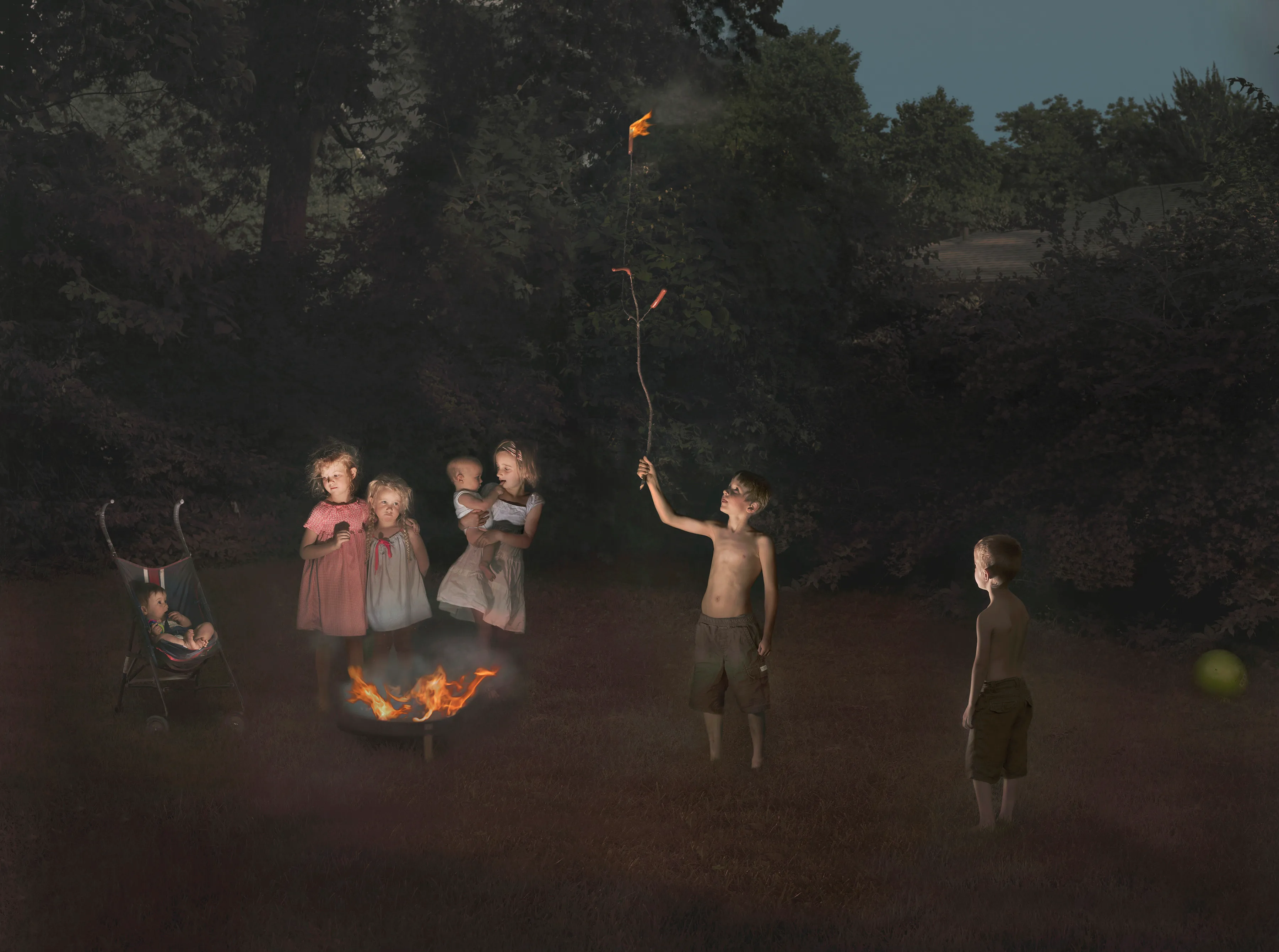 “I suppose I could make a work where the sun is shining, the mom is lying out in the grass, the kids are happy, and everything is perfect, but that wouldn’t interest me—and it wouldn’t be truthful. My aim is to create a more nuanced, subtly humorous and satirical portrait of the way we live today.” - Julie Blackmon

The playfully artful and chaotic elements present in the photographs of Julie Blackmon (American, b. 1966) are drawn from the everyday people and places of Blackmon’s daily routine in her hometown of Springfield, Missouri, which she describes as “a generic American town in the middle of the United States.” At first glance, the works may conjure backyard paradises of children at play; a closer look reveals children alone in backyards, garages, and neighborhoods, where the absence of adults suggests a looming potential for danger. The images brim with fantasy and subtle satire that capture a delicate balance between the darkness and charm of contemporary American life.

Blackmon carefully sets her scenes, but like film and theater
directors, she is in pursuit of unscripted moments that provoke,
disturb, and challenge the viewer. Some of the images reference
paintings by Dutch masters, French impressionists, and such modern painters as Hopper and Balthus, but they are updated with a satirical, penetrating eye and Blackmon’s belief that artful fiction can capture the truth more memorably than the truth itself.

#16