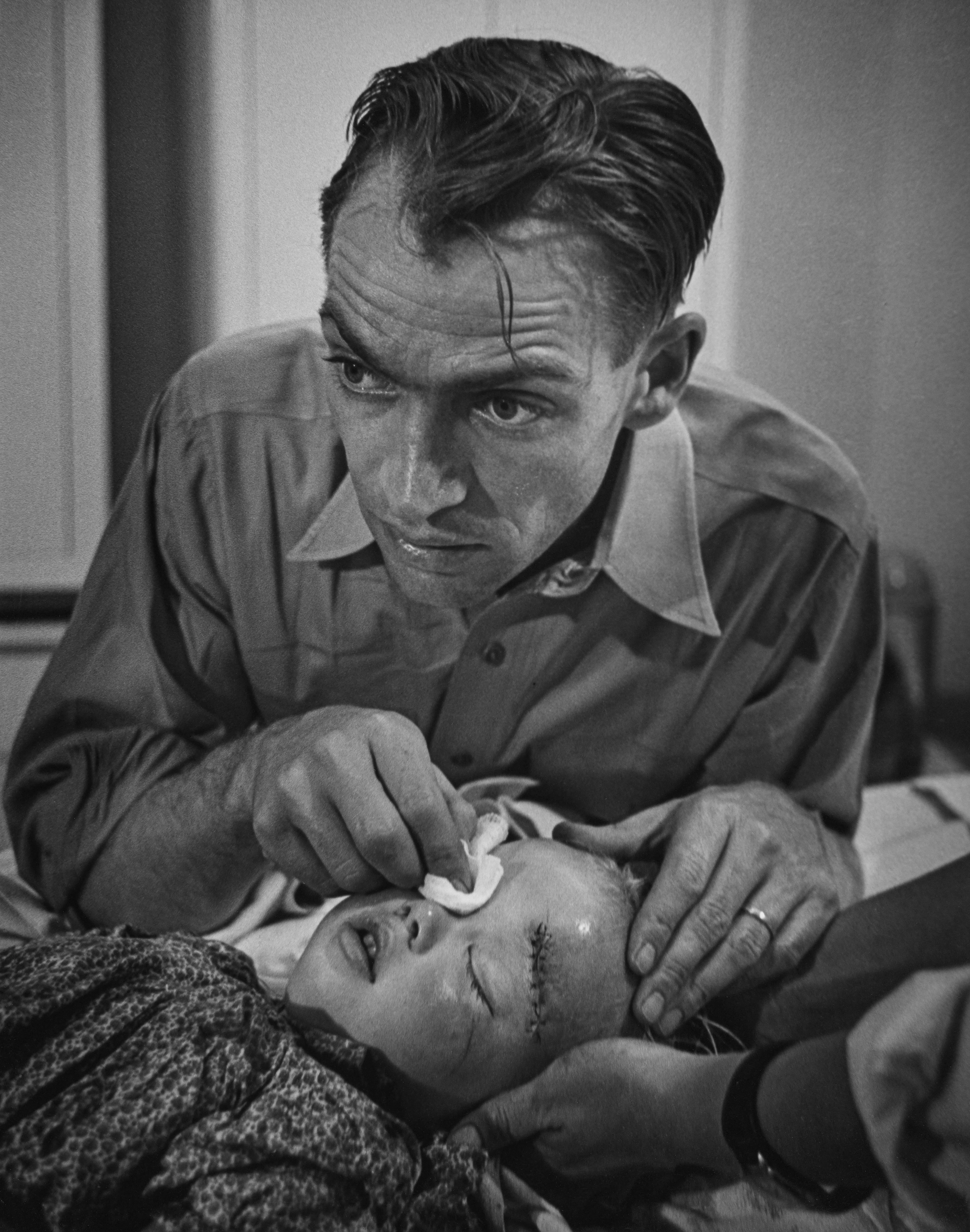 After World War II, LIFE magazine assigned staff photographer W. Eugene Smith a human interest story about a doctor in rural America. They sent him to Kremmling, a small and remote town in northern Colorado. His subject: Dr. Ernest Ceriani. 

At first, Smith observed Dr. Ceriani and earned the trust of the townspeople. He wrote: 'I spent four weeks living with him. I made very few pictures at first. ... I simply faded into the wallpaper and waited.' The resulting story spanned 11 pages in LIFE's September 20, 1948 edition.

Smith's intimate series depicts Dr. Ceriani as a heroic yet weary figure who made house calls, delivered babies, and tended to the young and old alike. Through Smith's lens, Ceriani carries the weight of the world on his shoulders as the only doctor within 400 miles. 

A LIFE compendium later summarized 'Country Doctor' as "an instant classic when published, establishing Smith as a master of the commanding young art form of the photo essay, and solidifying his stature as one of the most passionate and influential photojournalists of the 20th century." As TIME magazine explained in its 2016 compendium '100 Photographs: The Most Influential Images of All Time': "By digging so deeply into his assignment, Smith created a singular, starkly intimate glimpse into the life of a remarkable man. It became not only the most influential photo essay in history but the aspirational template for the form.'"