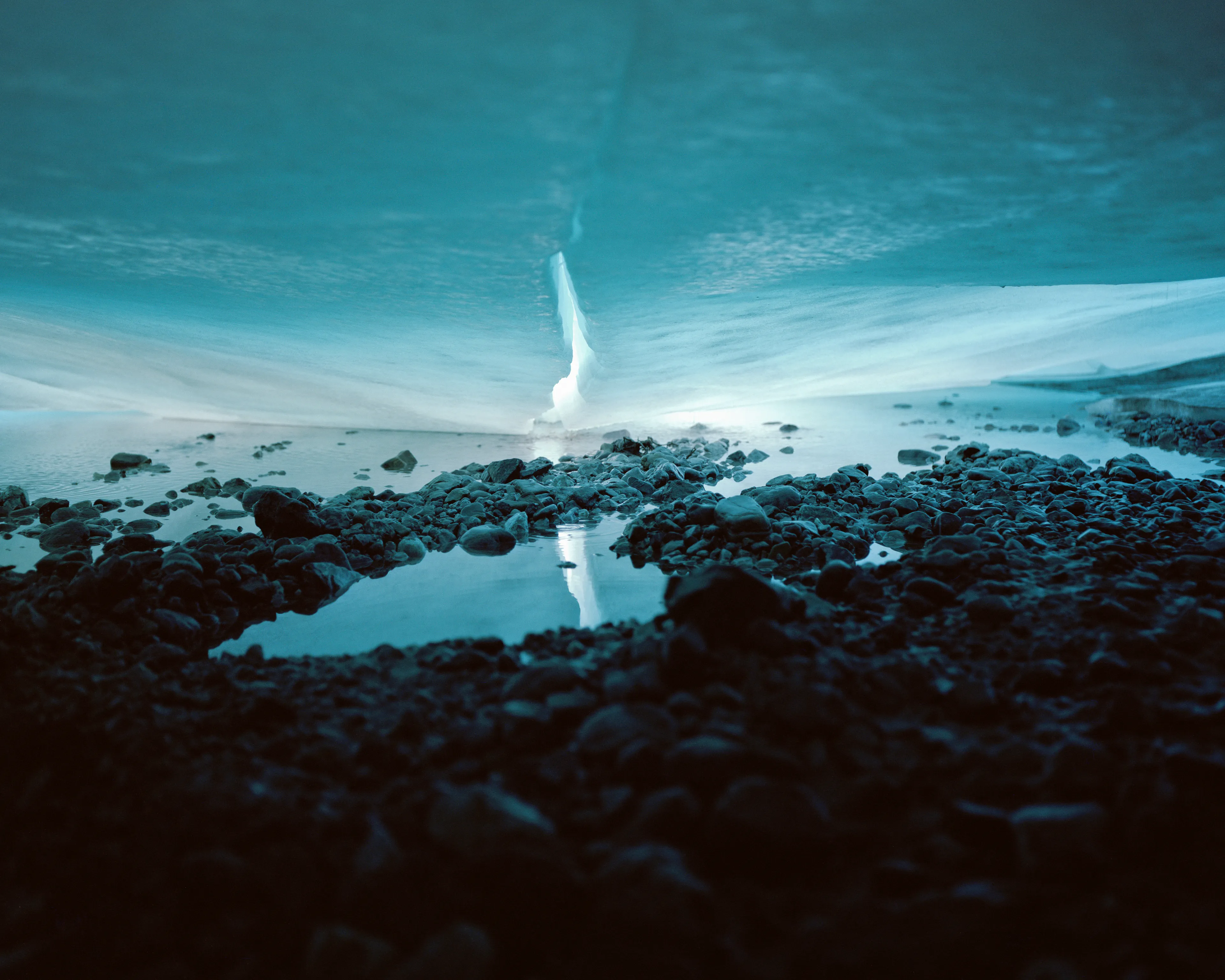Polaris is a meditation on otherworldly encounters in the Circumpolar Northern landscape. At once an inward and outward exploration, the images reflect my childhood perception of the natural world: a realm of wonder, mystery, and sometimes magic.

To me, nature is the source of spiritual well-being, and making
photographs is a way to connect with that source. These images reconstruct a childhood mythology in the boreal Alaskan landscape, where I was raised. The series explores the affinities
between Iceland and the Alaskan Arctic; distant regions connected by climate, remoteness, and
seismic activity. By traversing the landscape on foot in a receptive state of mind, numinous experiences reveal themselves. Ice, weather, animals, and celestial phenomena take on significance, and our human scale in geologic time becomes clearer.

These images convey transcendent encounters, each imparting a sense of wonder in the presence of the unknown. Polaris, the North Star, functions as a metaphor for the presence I feel emanating from these places, the only constant in environments that are otherwise in constant flux.