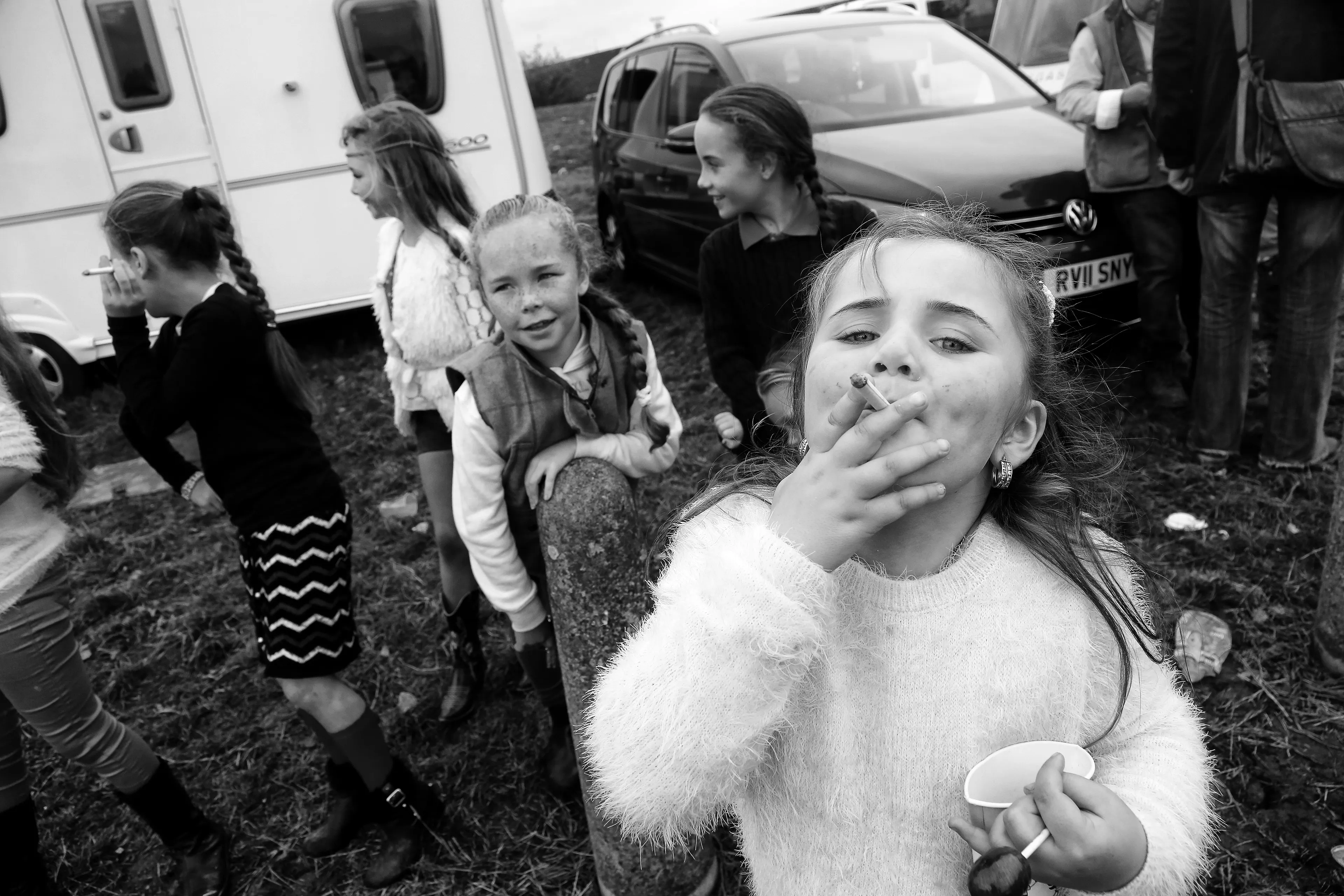 "I have spent my entire career photographing children all over the world. The last several years I have focused my eyes on the Irish Traveller that live in caravans on the side of the road or in open fields throughout Ireland.

The Traveller community are an Irish nomadic indigenous ethnic minority. There is no recorded date as to when Travellers first came to Ireland. This is lost to history but Travellers have been recorded to exist in Ireland as far back as history is recorded. Even with their great history they live as outsiders to society and face unbelievable racism growing up. As a mother of two daughters I became so interested in the culture and traditions and lives of these children. I have spent many years traveling back and forth to Ireland to document these incredible children."