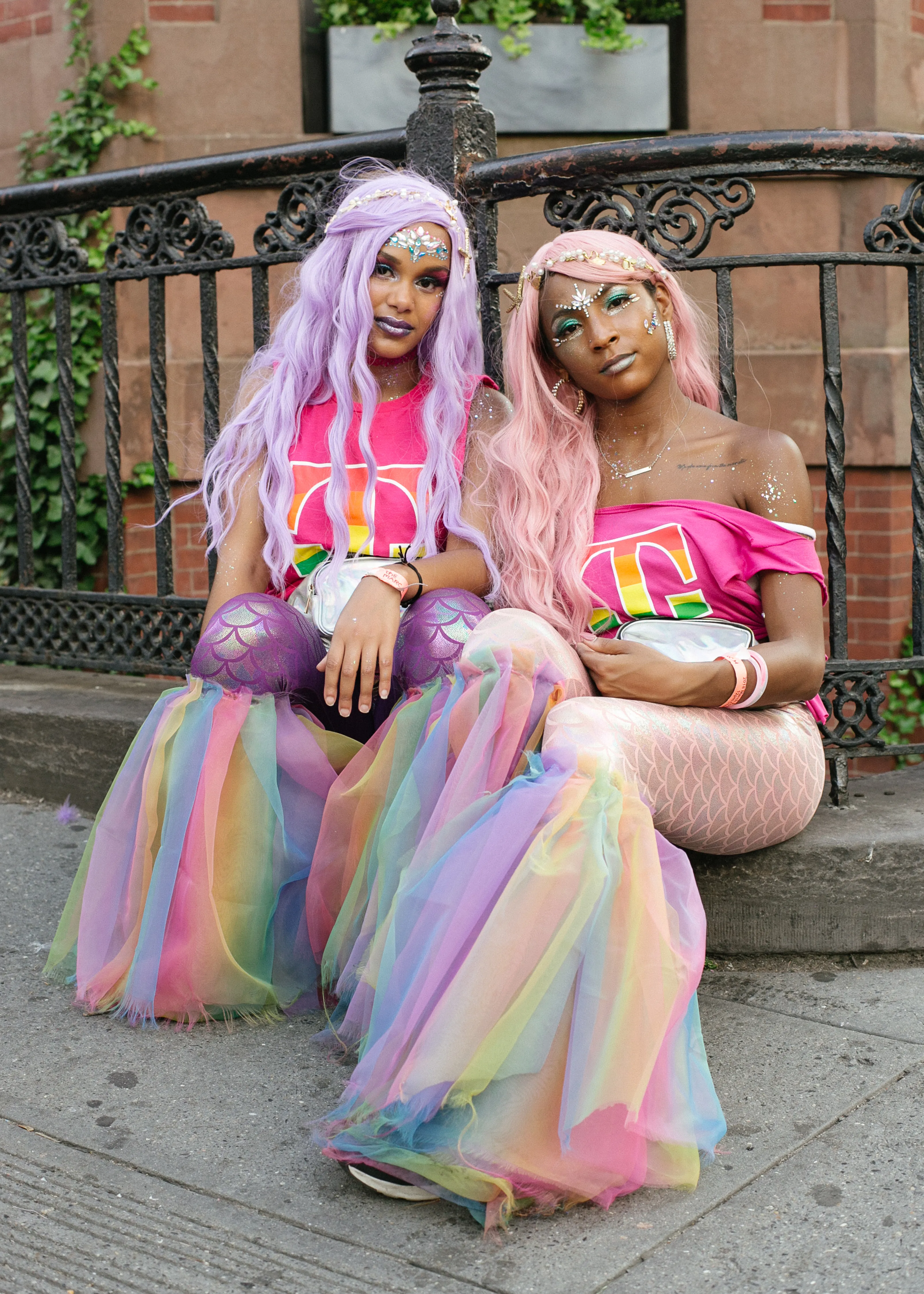 In the early morning on June 28, 1969, police raided the Stonewall Inn, one of the few gay clubs in New York City's Greenwich Village. Tired of constant police harassment, the bar patrons decided to take a stand, which resulted in violent confrontations with law enforcement and demonstrations for the days following. Marsha P. Johnson, a Black trans woman, along with her friend Sylvia Rivera, another transgender woman of color, played key roles in leading the Stonewall riots that inspired the gay rights movement in the United States and around the globe.

I attended my first Pride parade when I moved to New York in 2007. I was captivated by the diversity of the attendees, THE FASHION, the spirit of resistance, the overwhelming joy and the unapologetic celebration of individuality. It was extremely inspirational to witness hundreds of people showing up authentically as themselves. Two years later, I picked up my camera and made my way to the parade in Manhattan, carrying with me the spirit of what I experienced that last Sunday in June, 2007. 

I am inspired by acts of resistance and the way that shows up in society. Culture, norms, values, and lifestyles that go against dominant ideology move me in a deep way. I often think about the ways in which people gather and organize to effect change. And historically, how marginalized people, POC, specifically Black people in the United States have resisted discrimination and segregation through non-violent resistance, fashion, protests, and marches.

STREET QUEENS is my homage to those whose very existence is an act of resistance, who fight daily to be seen, who have inspired me in such a short time to live life fully. It is a visual celebration of the souls who I have had the honor of meeting and photographing at Gay Pride Parades across the US. This series includes portraits I’ve taken since 2009 in Los Angeles, San Francisco, Albany, Brooklyn, NY city, Boston and Philadelphia.

- Stephanie Mei-Ling