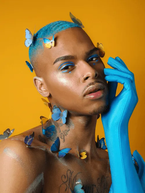 The series Spectrum celebrates a community of innovative artists in New York City who present themselves in a new and unapologetic way. They express individuality and empowerment through extravagant fashion and makeup that embodies their vibrant personalities. In an expanding world of hegemonic social media, I feel the importance to capture those who carve out their own unique space within it.Spectrum documents those who cannot be defined. It is inspired by Renaissance portraiture, where subjects built societal prominence through their visual representation. Through this approach, I found my way to reinterpreting a history of those who were excluded from positions of power and beauty.Influenced by this visual language of soft power, I create space for subjects to fully express themselves. These photographs place the subjects within a rich and fantastical world of their own design, utilizing makeup and effects to allude to the worldly power and strength conveyed in western art historical conventions.