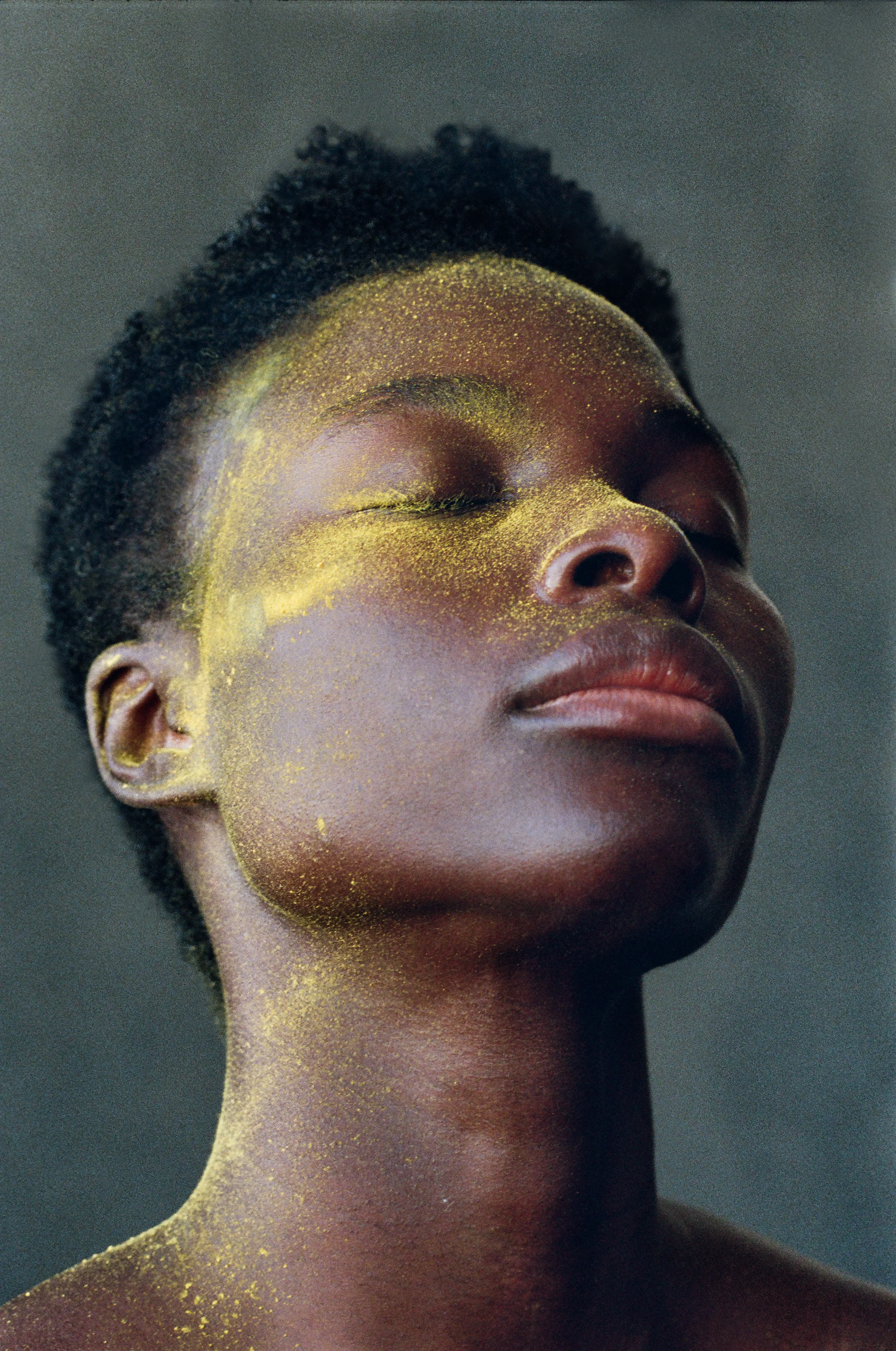 For centuries, the art world was seen through the eyes of a small few who, under a patriarchal society, chose the aesthetic and the narrative—and whose main depiction of the sacred female body was as an objectified and sexualized woman. 

Delphine Diallo aims to change this dynamic. Her intention is for every woman she photographs to feel the image she makes of them is a personal gift. “I am not taking pictures, I am giving pictures,” as Diallo puts it. By engaging in intimate conversations with her subjects, Delphine removes the sense of vulnerability that often comes with being photographed. Working with body painters and jewelry and mask makers, Diallo also uses traditional mythology and spiritual symbols to empower her subjects. Her portraiture is all about connection and exchange. She believes women are deep beings and connects with them on an emotional level. The French-Senegalese photographer spends more time speaking with her subjects than photographing them. 

Diallo’s photographs are never discriminating, yet deeply communicative, and portray women beyond judgment, soaking up their limitless beauty. Diallo's works are meant to encourage every woman to write a personal narrative, to take a stand, to have a firm voice. No preparatory models, sketches, or plans lay behind her photographs, which depict only outstanding feminine painted bodies. It is all a part of the vision flowing out of the artist's mind, grounded in her right brain hemisphere, predominant in her energetic and vibrant personality. 

Drawing elements from eastern mythology and philosophy, whilst always ennobling and empowering women, her practice is reminiscent of Oriental 19th-century painting. Looking at Krishnamurti, Frantz Fanon, Joseph Campbell, Bruce Lee, Aimé Césaire, and A.D. Wilson as deep inspirational sources, her photographs raise awareness, appealing to all women to awaken their senses. Diallo immerses herself in the realm of the feminine universe and her eloquent portraiture technique unveils and stirs unexplored emotion and insight meant to reach beyond appearances. 

“We are in constant search for wonder and growth. I see art as a vessel to express consciousness and as an access to diffuse wisdom, enlightenment, fear, beauty, ugliness, mystery, faith, strength, fearlessness, and universal matter”.

Artist: Delphine Diallo
Date: 2019