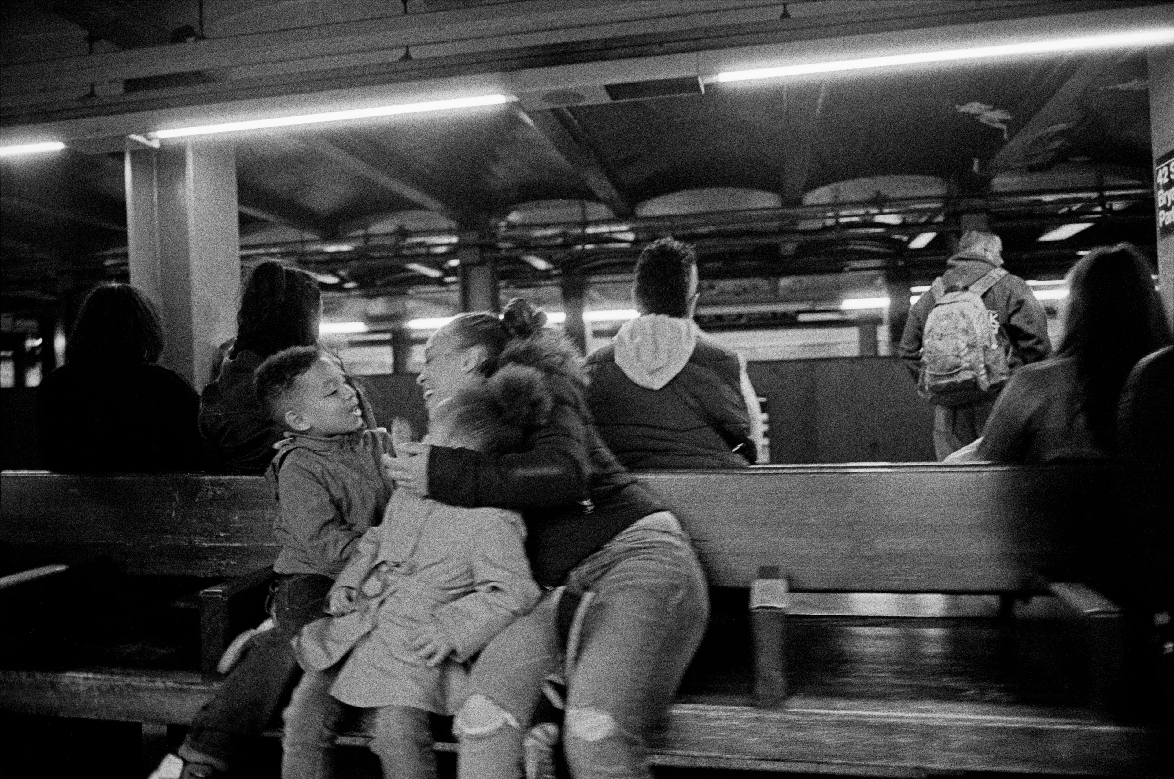 Inspired by the classic observer artists before him (al la Roy DeCarava, Garry Winogrand, and Robert Frank) Laurent Chevalier brings a modern spirit and informed sophistication to this collection of New York City photographs. This collection is a story of New York City, but it is specifically a story of Blackness. Spanning a period of 5 years and punctuated by poetry written by Brooklyn native Dr. Jamila Lysicott, Enough is a tangible exploration of the intersections of the Black experience. Through a lens of candid observation, Enough explores themes of patriotism, power, family and spirit. It does not seek to describe an experience holistically, but rather to present avenues that the viewer may choose and follow at will.

Medium: 35mm black and white negative