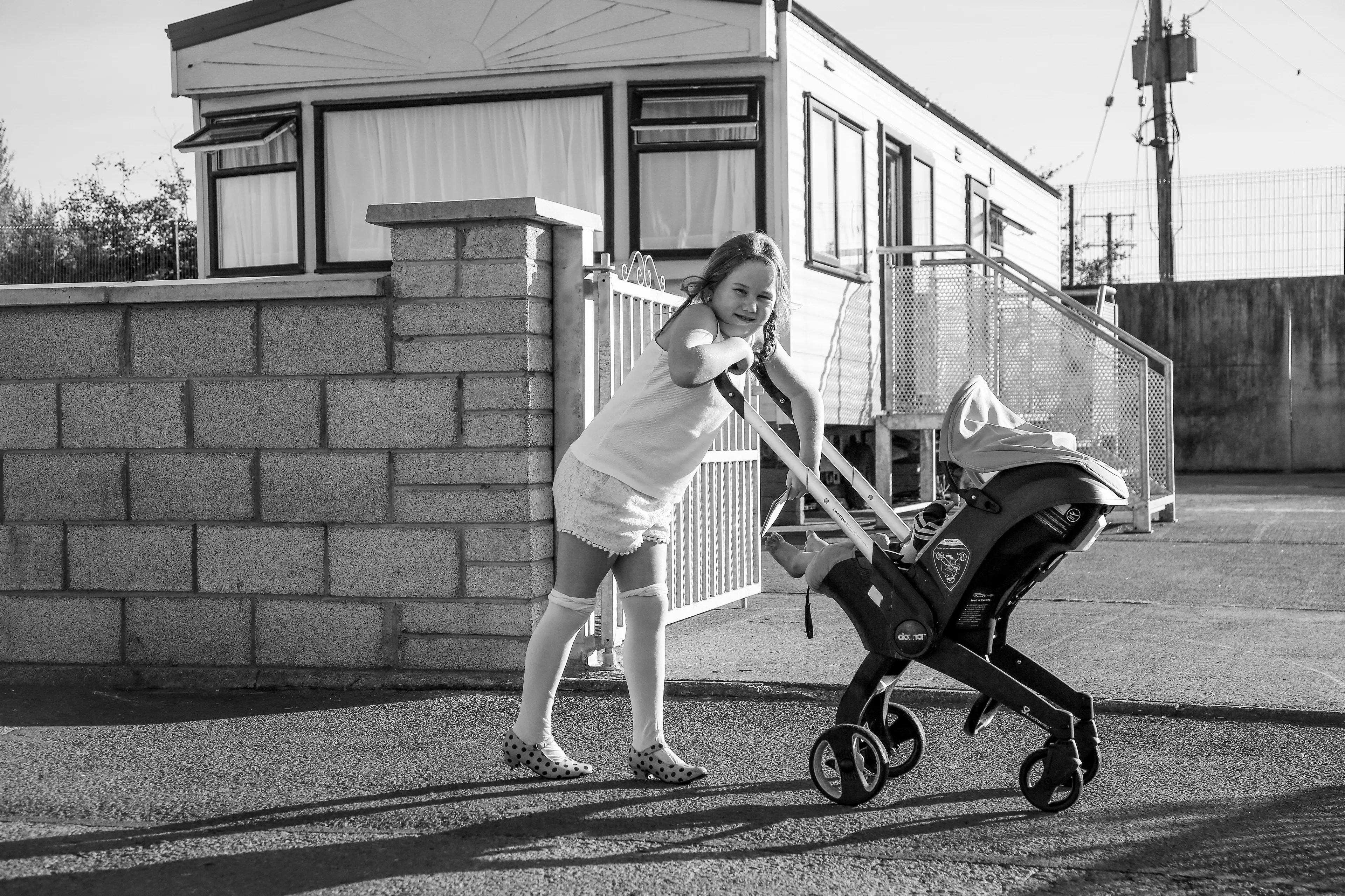 "I have spent my entire career photographing children all over the world. The last several years I have focused my eyes on the Irish Traveller that live in caravans on the side of the road or in open fields throughout Ireland.

The Traveller community are an Irish nomadic indigenous ethnic minority. There is no recorded date as to when Travellers first came to Ireland. This is lost to history but Travellers have been recorded to exist in Ireland as far back as history is recorded. Even with their great history they live as outsiders to society and face unbelievable racism growing up. As a mother of two daughters I became so interested in the culture and traditions and lives of these children. I have spent many years traveling back and forth to Ireland to document these incredible children."