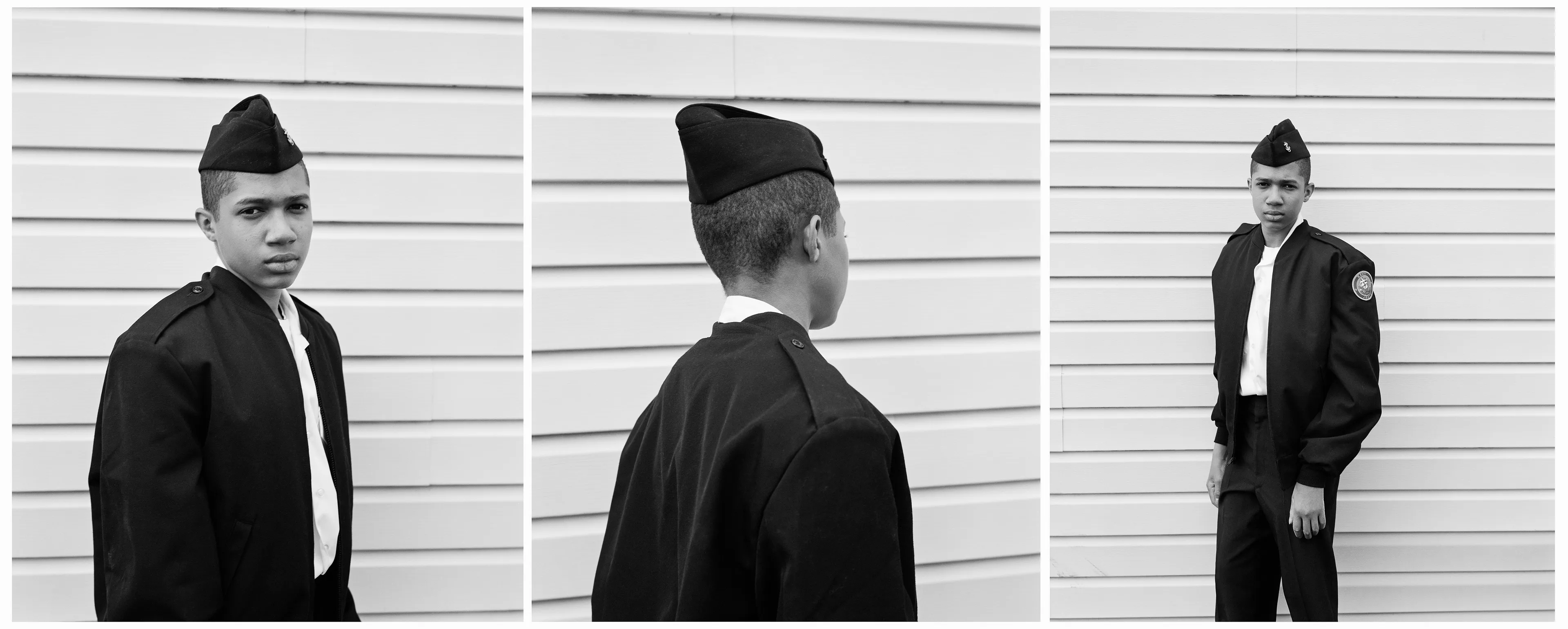 Right before I made the first image of Sharrod, when he went to his bedroom to change, his mother turned to me and said, “Whenever he puts on his uniform, I no longer see my son.”

In the winter of 2008 I met Sharrod, who was in his first year of high school and had recently enrolled in National Junior Reserve Officer’s Training Corps (NJROTC), a military preparatory program offered in high schools nationwide. After explaining my connection to the military and that I was an alum of the same high school that both Sharrod and his mother attended, I asked if I might photograph Sharrod from his freshman to senior year (2008-2012). They both agreed and over the course of the next four years, Sharrod played out his military fantasies for my camera. Sharrod also shared with me the photographs he was making with his cell phone and notebook doodles of weapon construction. These private images and examinations rub up against, color, and compliment the medium format images I’ve made providing the viewer a fuller image of Sharrod’s journey.

Over the course of making the images and video installations for "I slowly watched him disappear," I wondered about the process within which the military body is formed both literally but also psychologically, visually, and emotionally. What is the process of indoctrination and how does the heavy flow of military marketing messages — specifically in military towns— foreclose possibilities for a life beyond the uniform? Furthermore, can one photographically locate the transition from civilian to member of the military unit? 

"I slowly watched him disappear" is the first part of a multimedia “essay” including photographs, video installations, nonfiction films, curatorial projects, and texts which organize my meditations on the fantasy, construction, and deconstruction of the military body and its effects on the broader culture.  