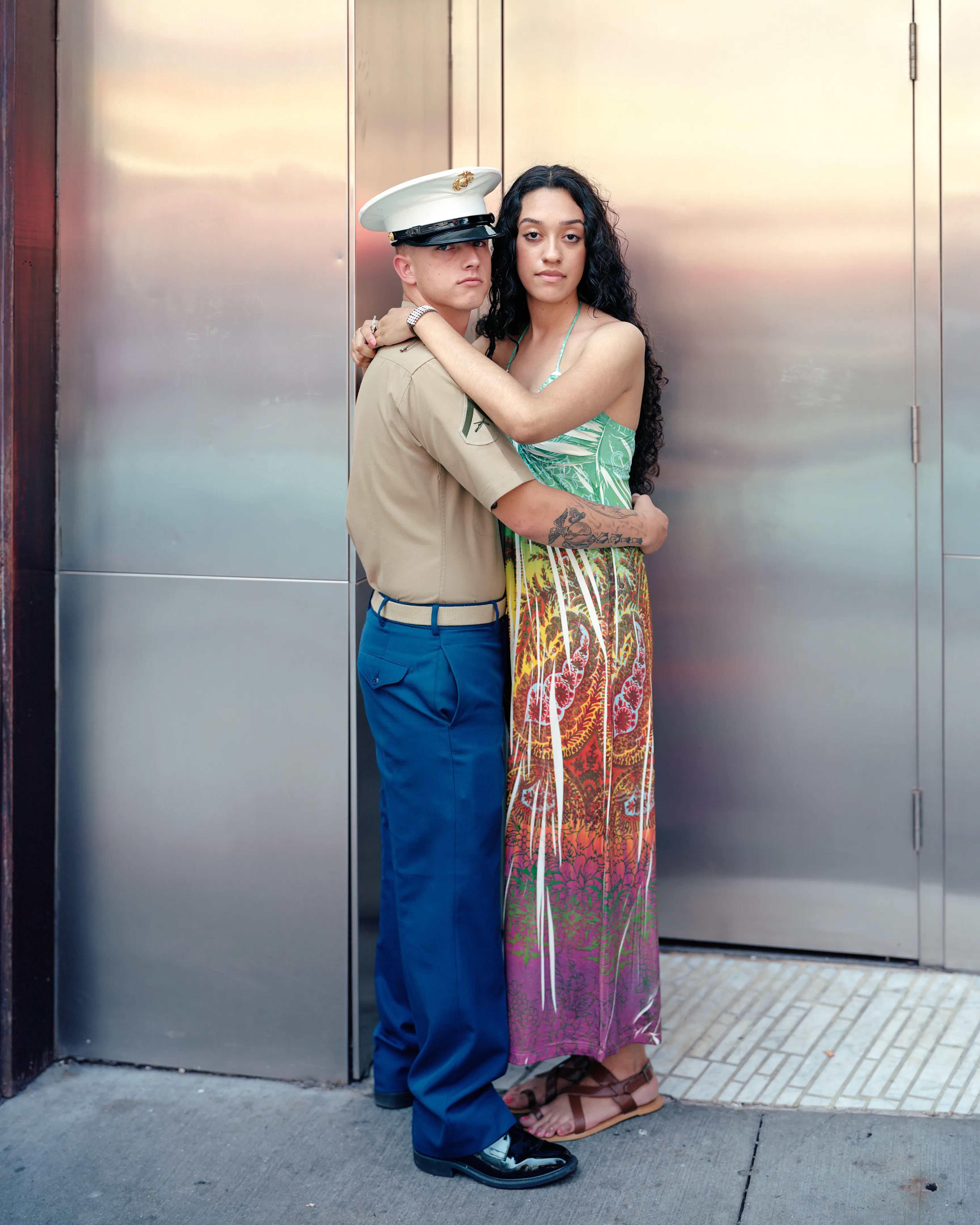 Richard Renaldi’s Touching Strangers embodies the human desire to connect despite our differences. Renaldi directed strangers to pose in front of a large-format, 8-by-10-inch view camera in towns and cities all over the United States. These startlingly intimate portraits reveal “humanity as it could be as most of us wish it would be and as it was, at least for those one fleeting moments in time.” These relationships may have only lasted for one moment, but the resulting photographs are moving and provocative, and continue to raise profound questions about the possibilities for breaking down social barriers with positive human connection in a diverse society.

#34