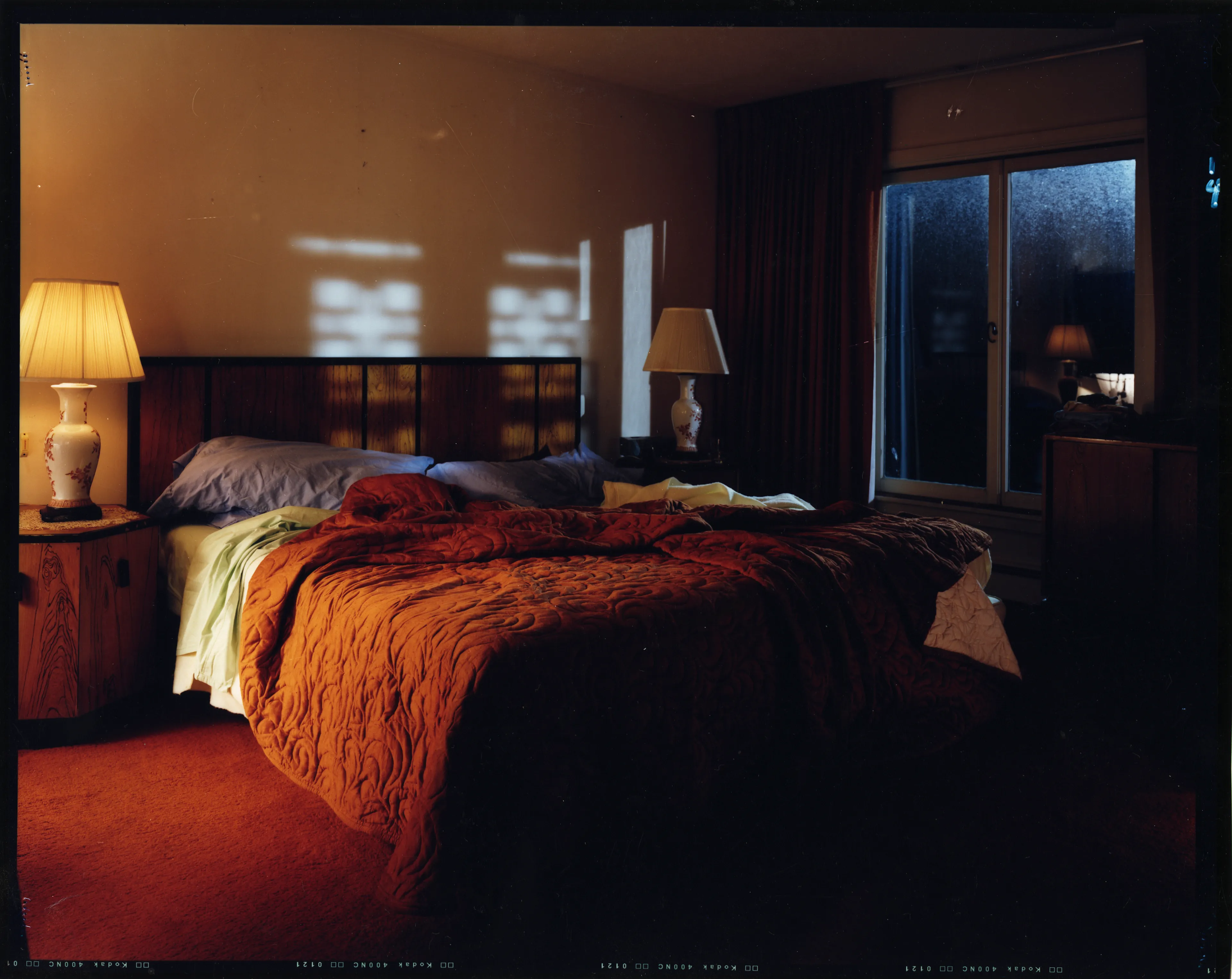 Crewdson’s 2002 project, Dream House peers into the unseen psychological dramas of domestic American life. Focused largely on elaborately staged scenes of home interiors, the twelve images from this portfolio represent frozen moments filled with clues and gestures that suggest underlying narrative sequences that bend ideas of family life into surrealist fantasy. In Dream House, Crewdson nods to the significant influence of cinema over his work by employing actors such as Philip Seymour Hoffman, Tilda Swinton, and Gwyneth Paltrow to stand in as subjects to perform Crewdson’s melodramas in still form. In doing so, Crewdson emphasizes the power of still narrative in relationship to stories told through time, and argues that photographic storytelling can exist as equal in stature to box office films.

Edition: 1 of 1