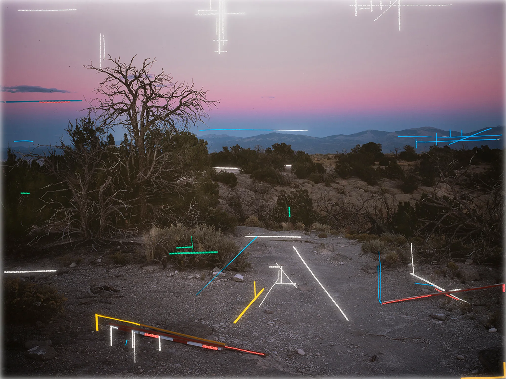 In this series I create geometric gestures in the landscape reminiscent of cave paintings to illustrate the complex relationship between language and abstraction blurring subjective interpretation and communal understanding. Caves and landscapes are uncivilized spaces free from cultural baggage, places that need no language, sites for the viewer to interpret freely, devoid of iconographic logic. The reflective safety tape that creates these shapes references my larger practice dealing with immigrant labor and construction work often performed by Latin American immigrants in the US. In English double negatives cancel one another and produce an affirmative, but in Spanish, they intensify the negation. Negative Concord conveys the struggle to meaningfully translate our human experience across languages and cultures. Now as part of the blockchain, these photographic NFTs become metaphors for this new, virtual landscape that is simultaneously being created, explored, and interpreted.