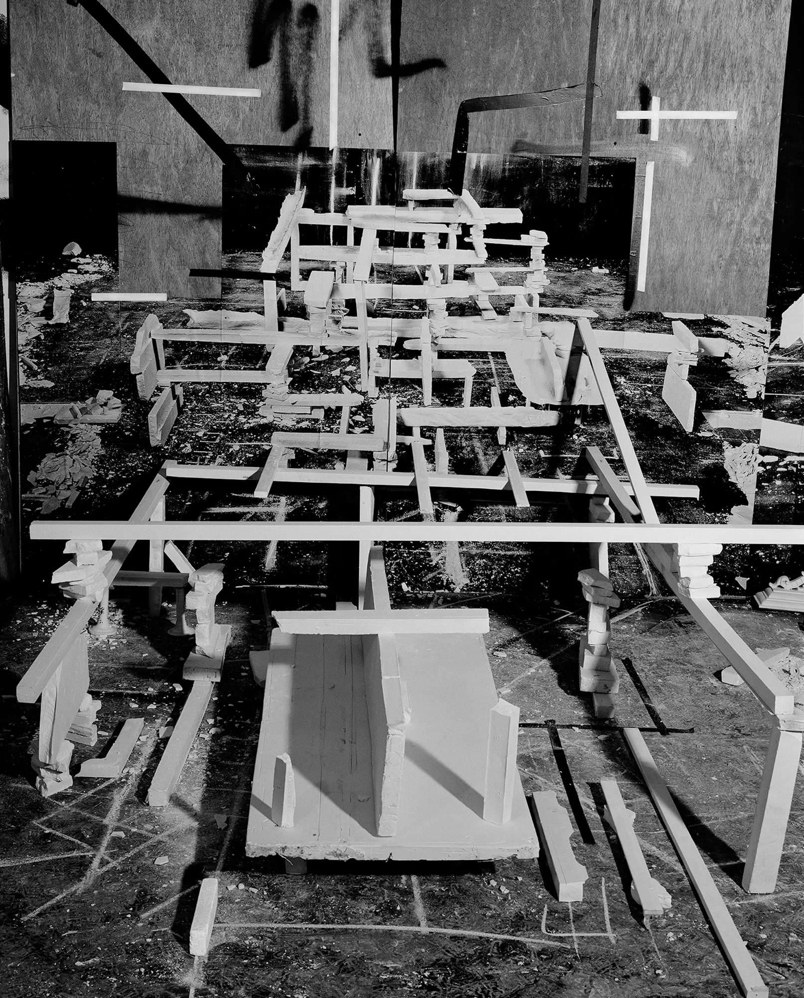 *Constructions* is my first NFT project, weaving together two of my most significant photographic series—*American Type* and *Hedonic Reversal*—as a unique set of 28 images. These architectural constructions, which I make in my studio and then photograph, reference forces of urban construction, destruction, and decay. Devoid of the depictions of labor from which these works were created and of which the work is inherently about, I also critique the ambiguity of post-war American abstraction and art world elitism. These works reference autobiographical threads in order to point to the larger sociopolitical backdrop upon which issues of migration and labor play out.