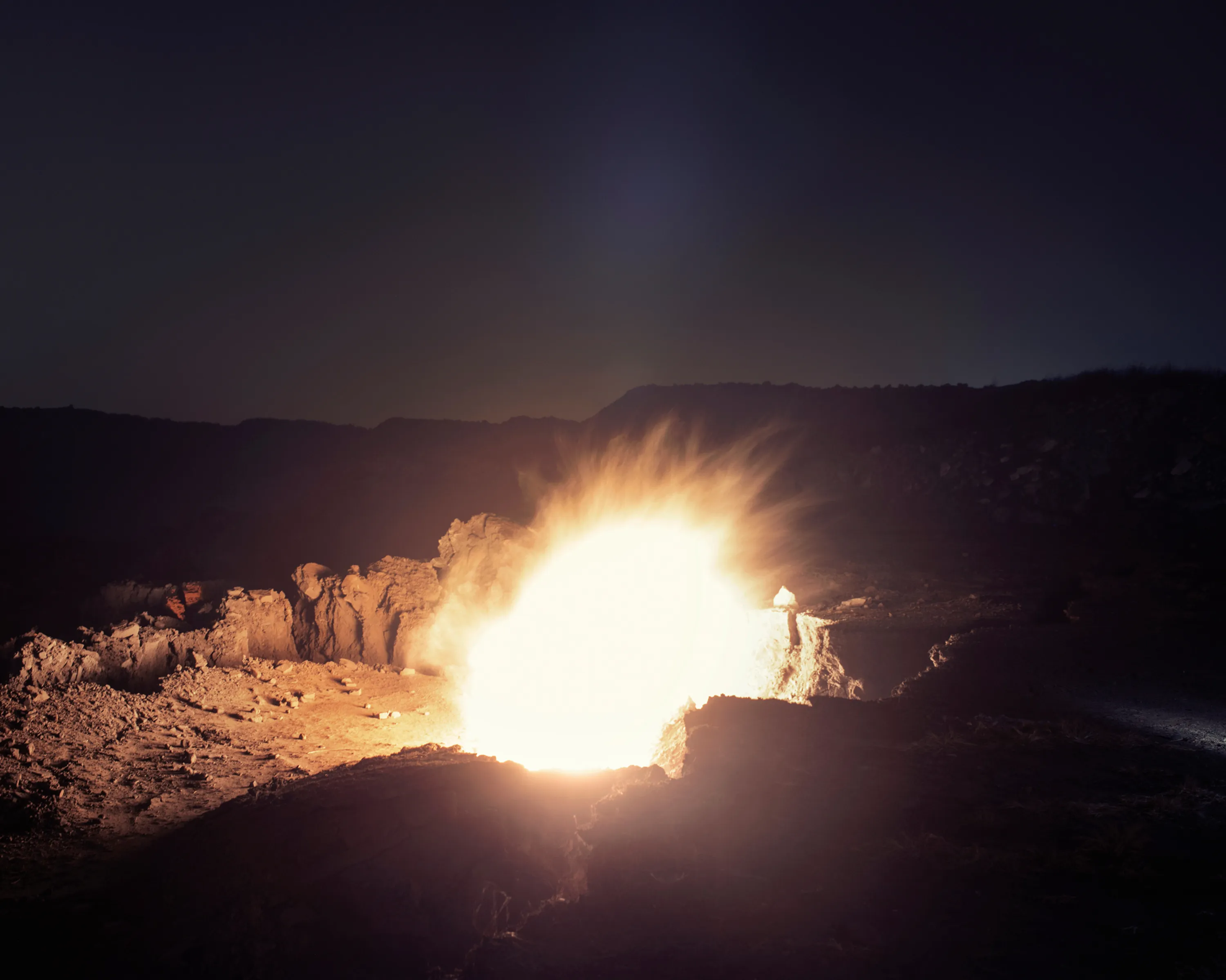 Assembly presents *Centralia* by Poulomi Basu, an award-winning series of photographs that exposes hidden crimes of war as an indigenous people fight for their survival. In war, truth is the first casualty; this work explores the unsteady relationship between reality and fiction and how our perceptions of truth are manipulated. *Centralia* has been called a hallucinatory reflection where an invisible conflict between a guerilla army, an indigenous people and the Indian state reveals wider issues of environmental degradation. Such exploitation comes at a price: the transmogrification of violence into the de-facto language of politics. Basu is an internationally-exhibited Indian transmedia artist and activist, a National Geographic Explorer, Sundance Fellow, Magnum Fellow, winner of Arles Discovery Award 2020, and nominee for the Deutsche Börse Prize 2021. A portion of proceeds from the sale will go to PARI Network to fund grassroots efforts to help Dalit women tell their own stories. 