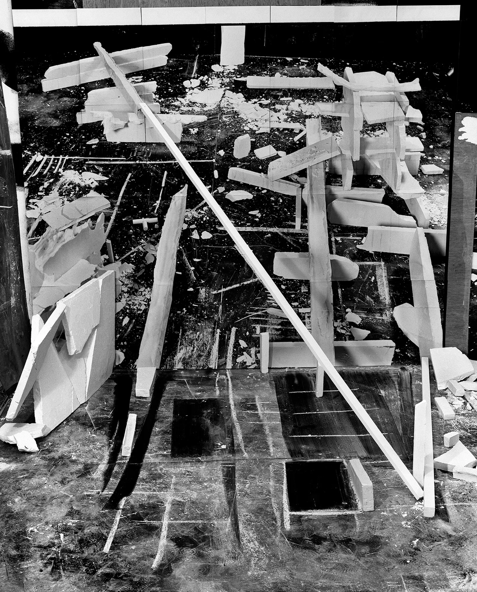 *Constructions* is my first NFT project, weaving together two of my most significant photographic series—*American Type* and *Hedonic Reversal*—as a unique set of 28 images. These architectural constructions, which I make in my studio and then photograph, reference forces of urban construction, destruction, and decay. Devoid of the depictions of labor from which these works were created and of which the work is inherently about, I also critique the ambiguity of post-war American abstraction and art world elitism. These works reference autobiographical threads in order to point to the larger sociopolitical backdrop upon which issues of migration and labor play out.