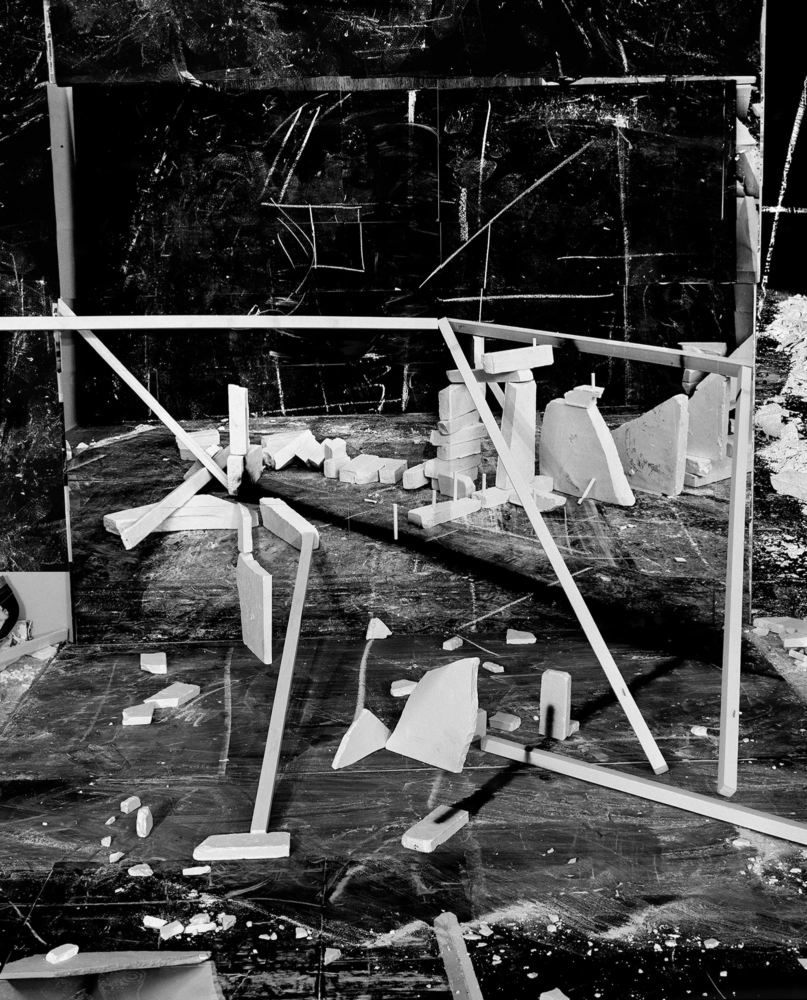 *Constructions* is my first NFT project, weaving together two of my most significant photographic series—*American Type* and *Hedonic Reversal*—as a unique set of 28 images. These architectural constructions, which I make in my studio and then photograph, reference forces of urban construction, destruction, and decay. Devoid of the depictions of labor from which these works were created and of which the work is inherently about, I also critique the ambiguity of post-war American abstraction and art world elitism. These works reference autobiographical threads in order to point to the larger sociopolitical backdrop upon which issues of migration and labor play out.