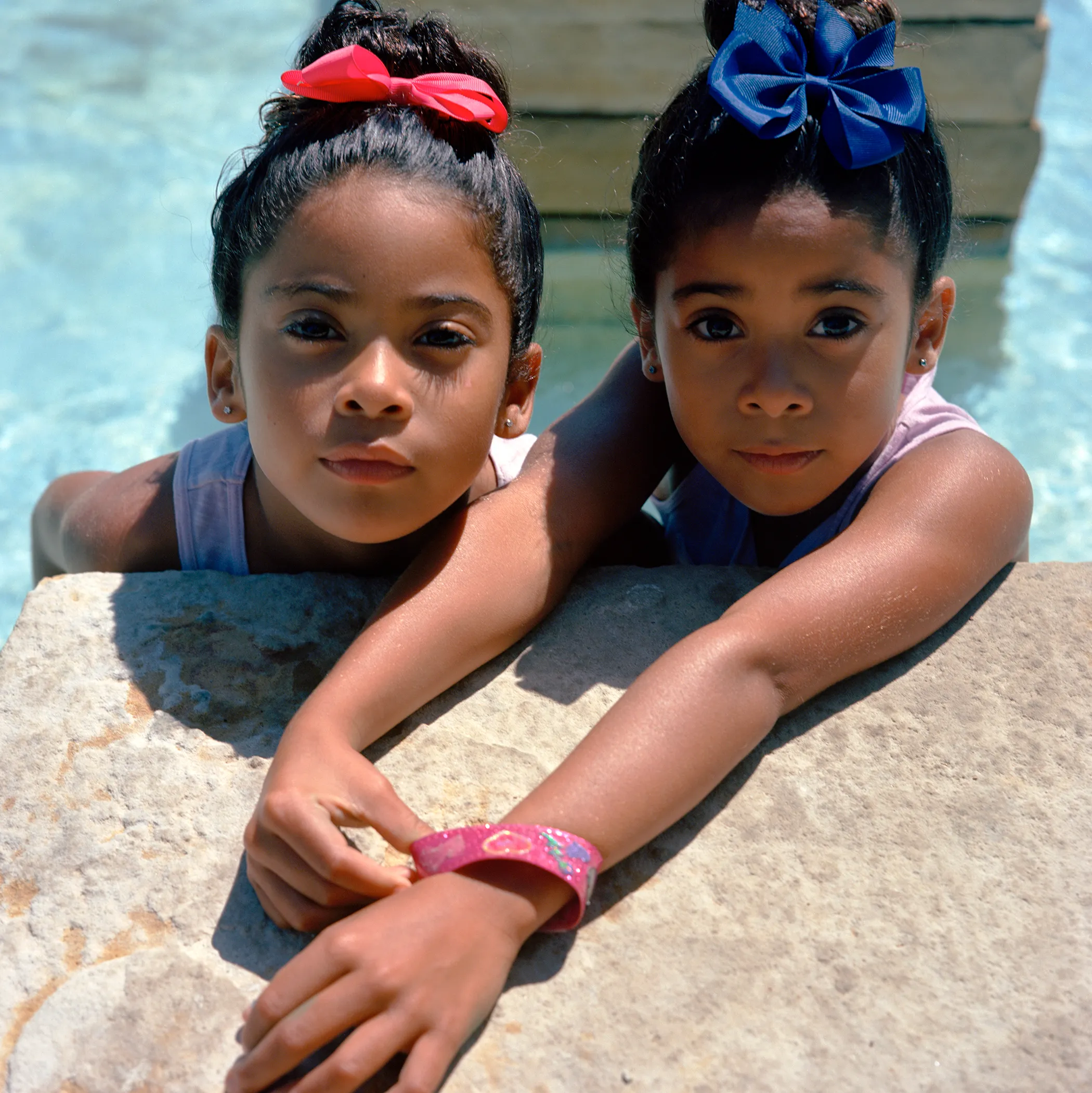 - Title: Evie & Ellie Houston

- Artist: Justin Aversano

- Medium: Darkroom C-Print

- Original Dimensions: 16" x 20"

- Price: $1,000

- Edition: 1/1

- Additional Information: Twins are thought to bring luck to those who see them and touch them, and they are showered with gifts and money from strangers. They are regarded as bearers of happiness, good luck and riches for their parents, but also as familiars of the gods, with extraordinary powers.