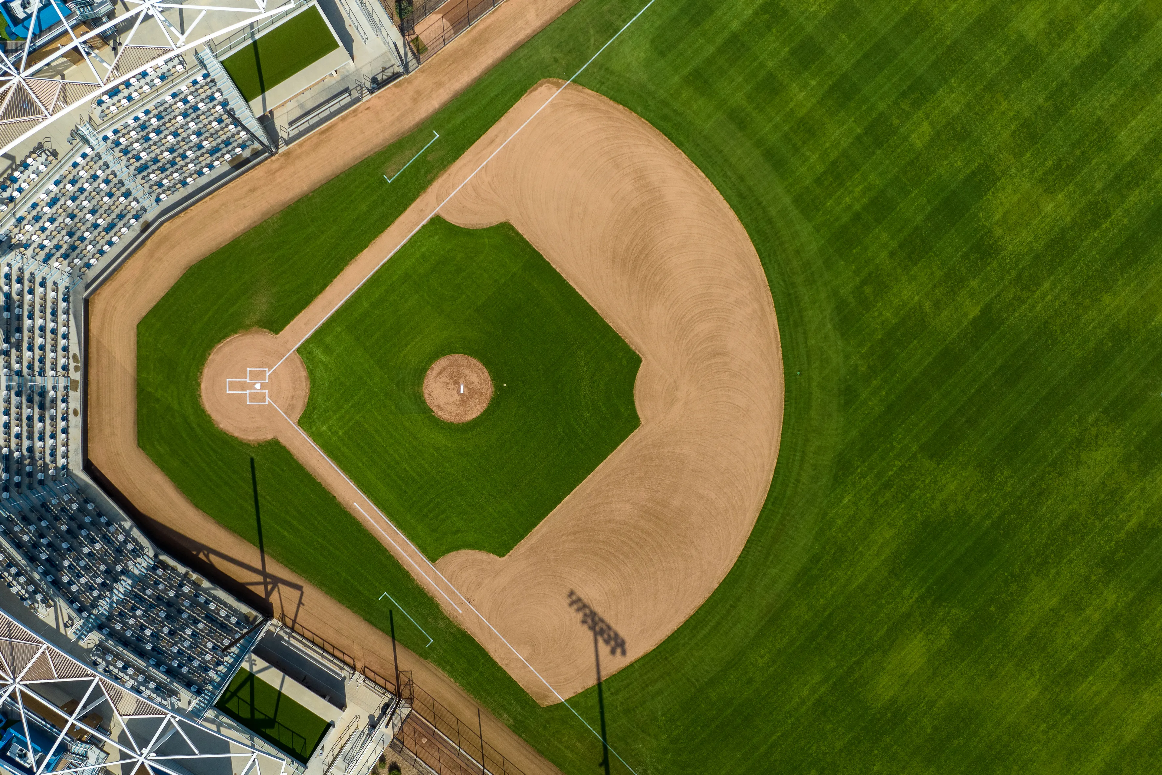 'Ballpark' is the 8th piece in the Olympian Season 2 Series - a follow up to the Olympian Series, my first work minted on SuperRare.  

An appreciation of the shapes, colors and patterns that exist on a Baseball Field, but with a non conventional finish to them!  

As part of the Olympian Season 2 Series 'Ballpark' is a study of the aerial view of the sports we hold so dear, and mean so much to us!