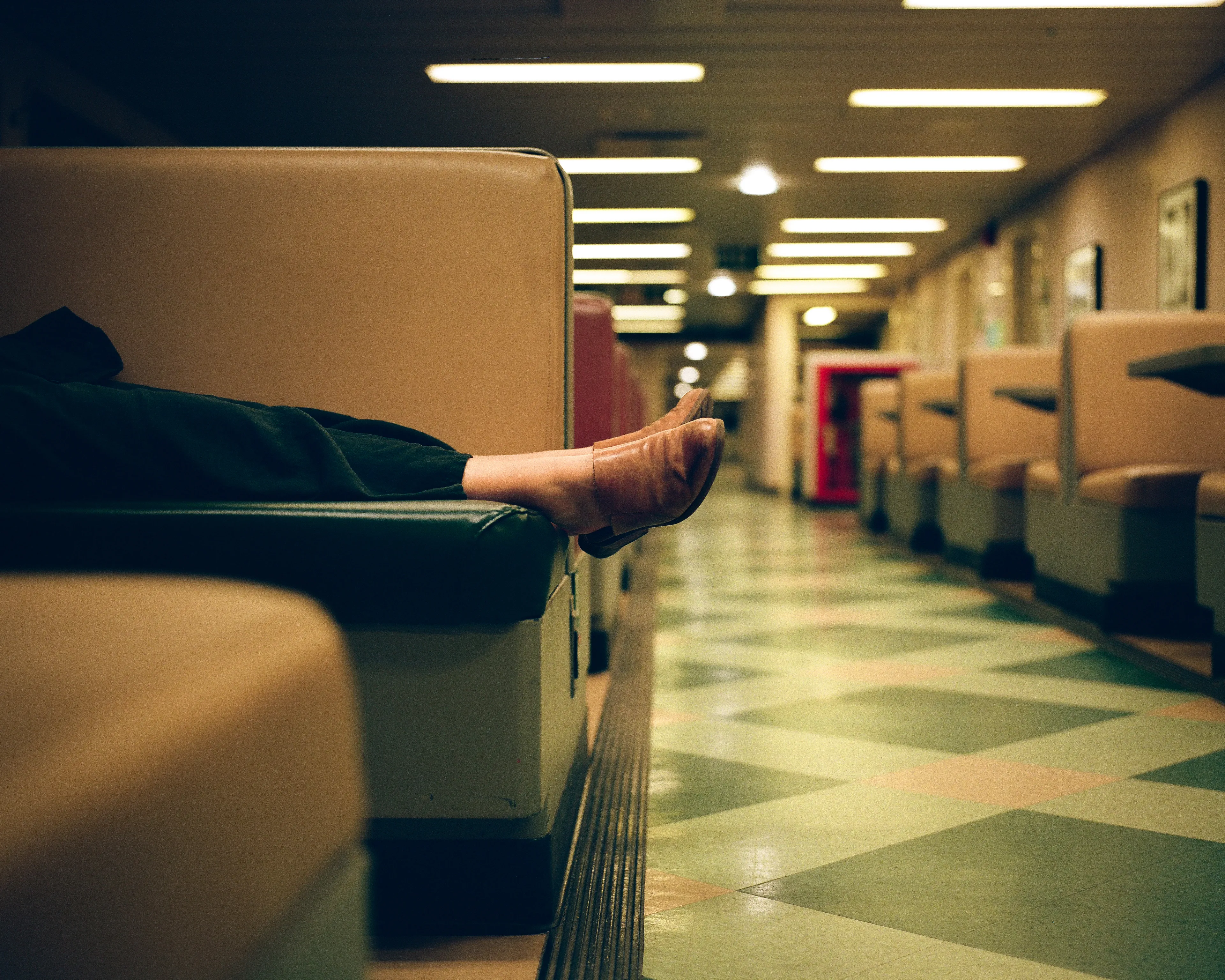 After a long day, the long, worn out leather booths on the ferry are the perfect place to get off your feet and catch some z's.
