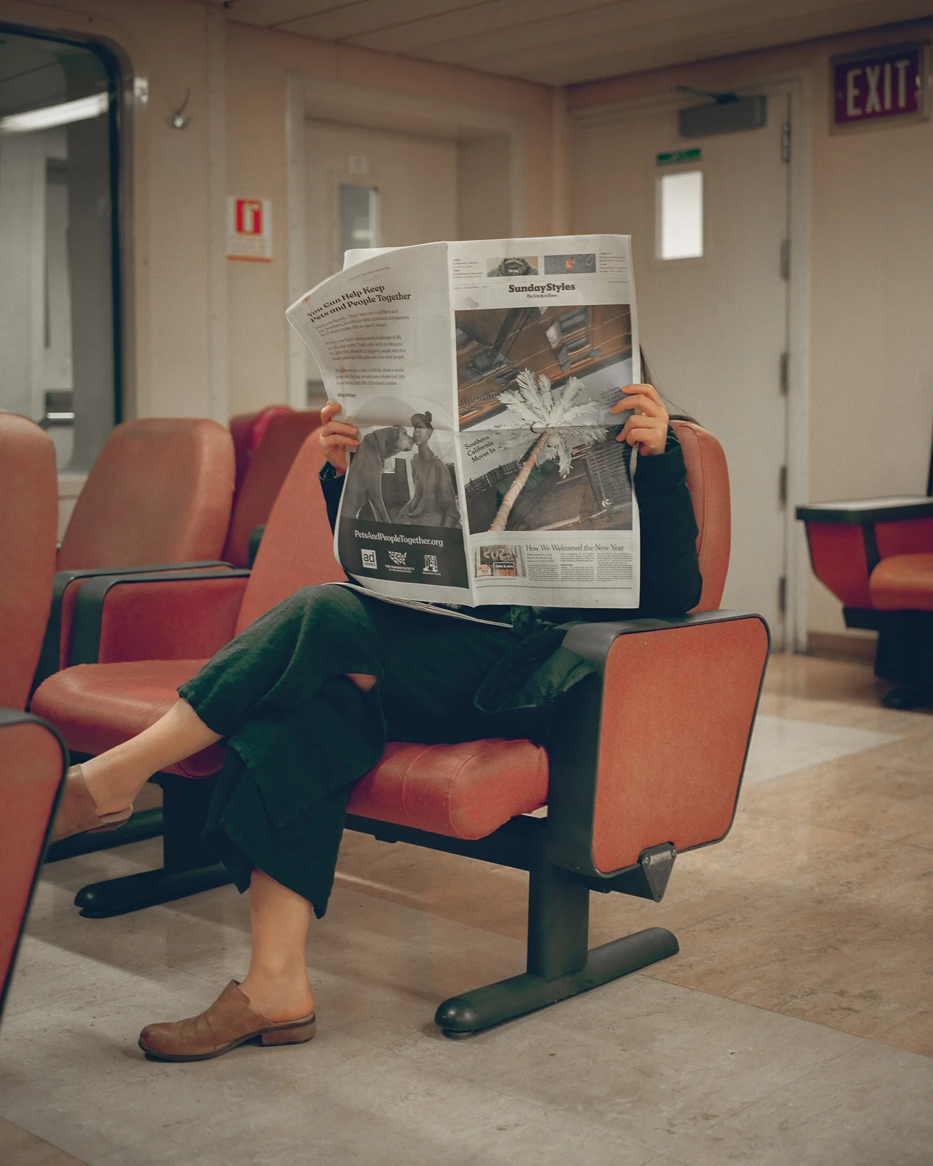 As the night ferry gently glided back to Seattle, its cozy ambiance enveloped the passengers in a soothing embrace. Amidst the soft hum of the engines and the rhythmic sway of the vessel, a lone passenger found solace in a vintage ritual: engrossed in the printed pages of a newspaper.