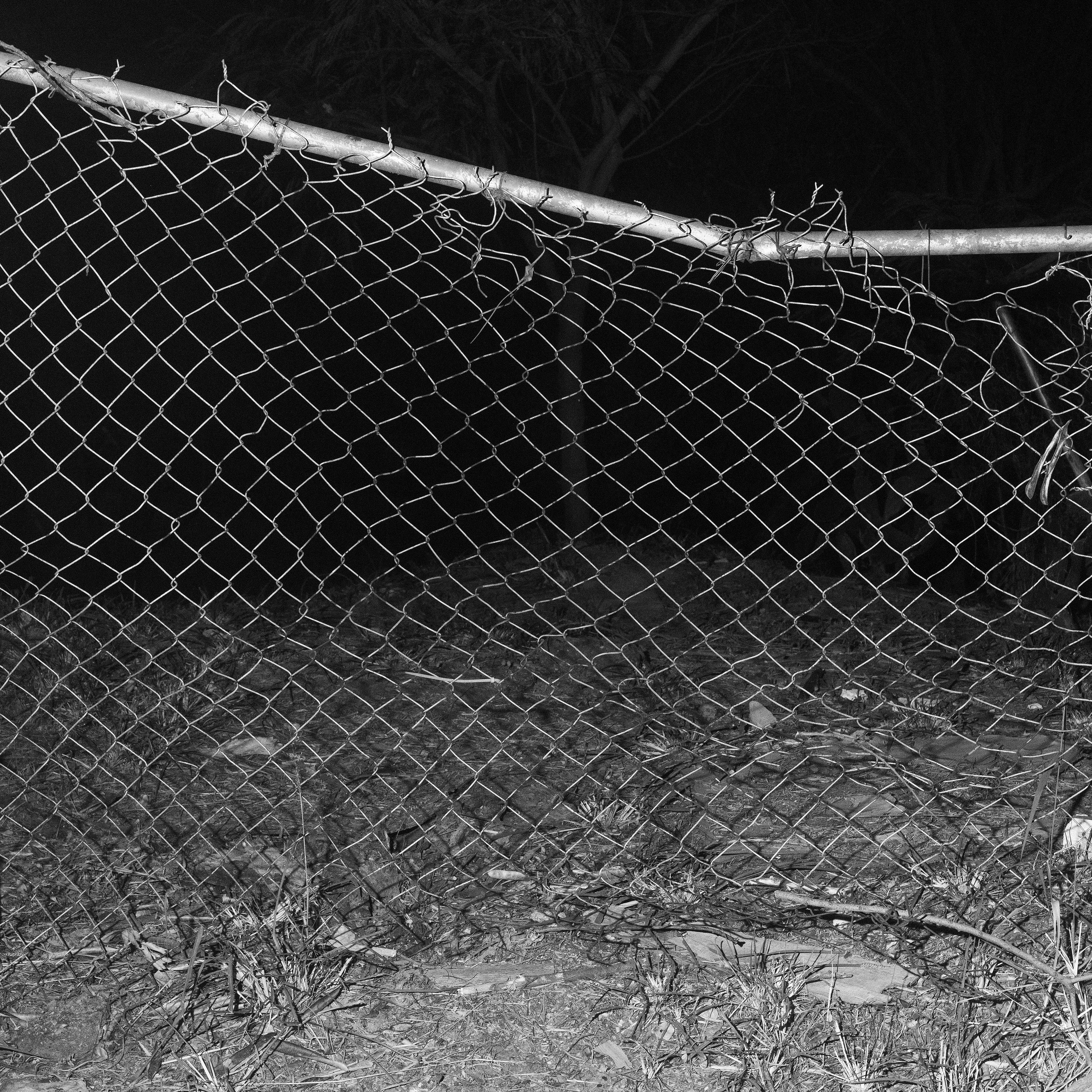 POINT OF ENTRY #1 by Fernando Gallegos

For a while I’ve been studying the language of the Latin American city through its urban awkwardness. A few months submerged in the NFT world have made me conscious of the apparent separation of both realities. In this work I look for the metaphorical fracture happening in the “real life” that makes the abstraction of the digital realm so appealing for some of us. These images, made late at night in the awkward metropolis of Monterrey, México, depict things and spaces in which there always seem to be something just beyond what's in front of us, as if we were at the edge of making a big discovery if we just took one step forward. As a group they create a landscape full of possibilities at the same time unsettling and exciting. 

Edition: 1 of 1

Commissioned by Obscura