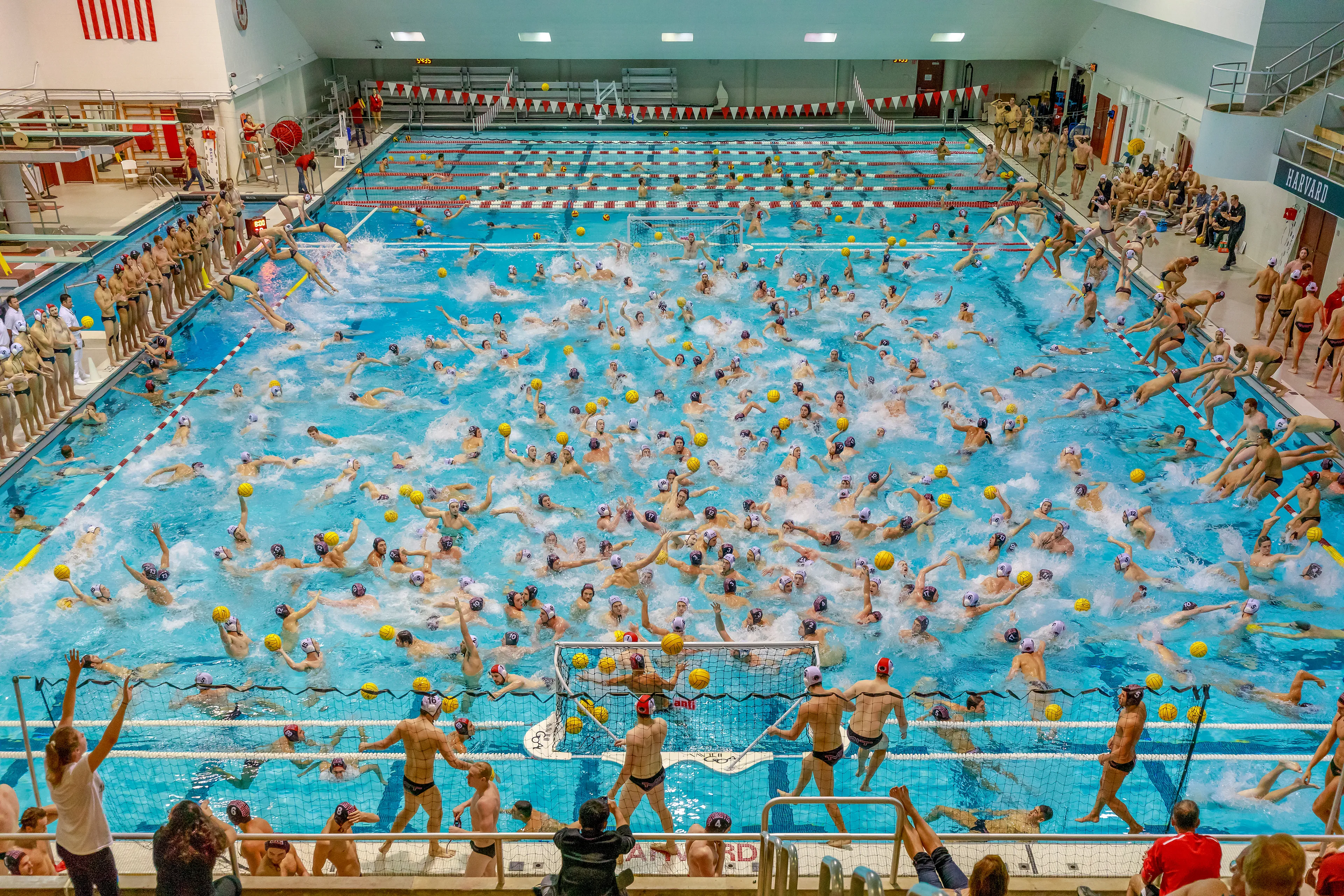 Each image is a kind of a still time-lapse photo that compresses a couple of hours and thousands of exposures of a sporting event into a single image that conveys a sense of play, the eeriness of time, and a feeling of Dionysian chaos.