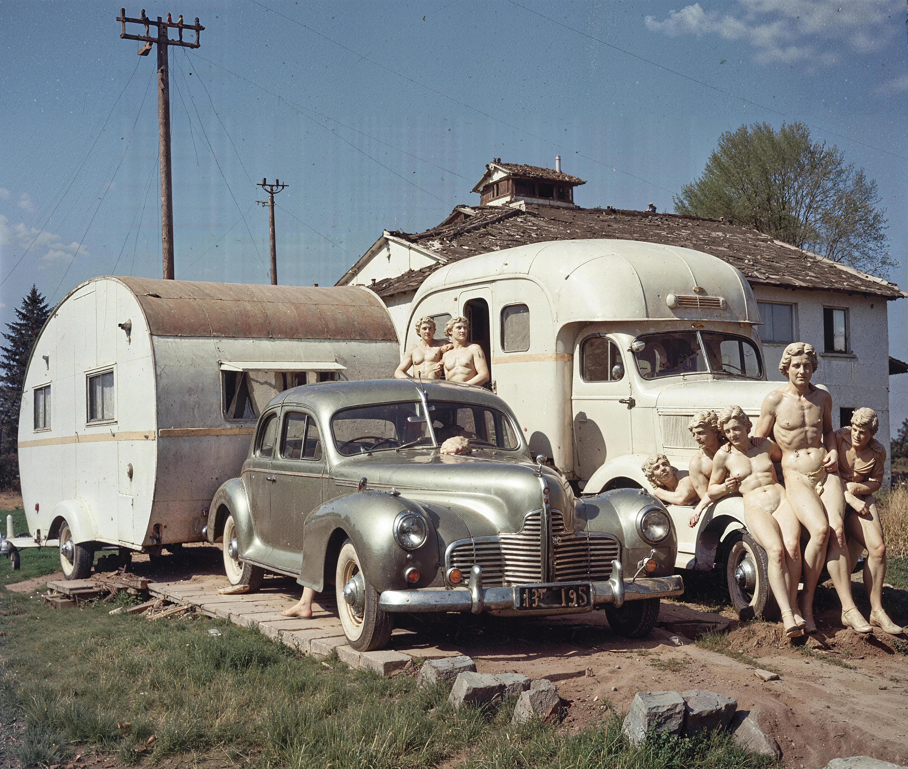 35mm #1: England, Norfolk, 1960s - A 1958 Rover 90 P4 & caravan parked in a field
35mm #2: India, Khajuraho, 1960s - Close-up of the erotic bas-relief sculpture in Lakshmana Temple