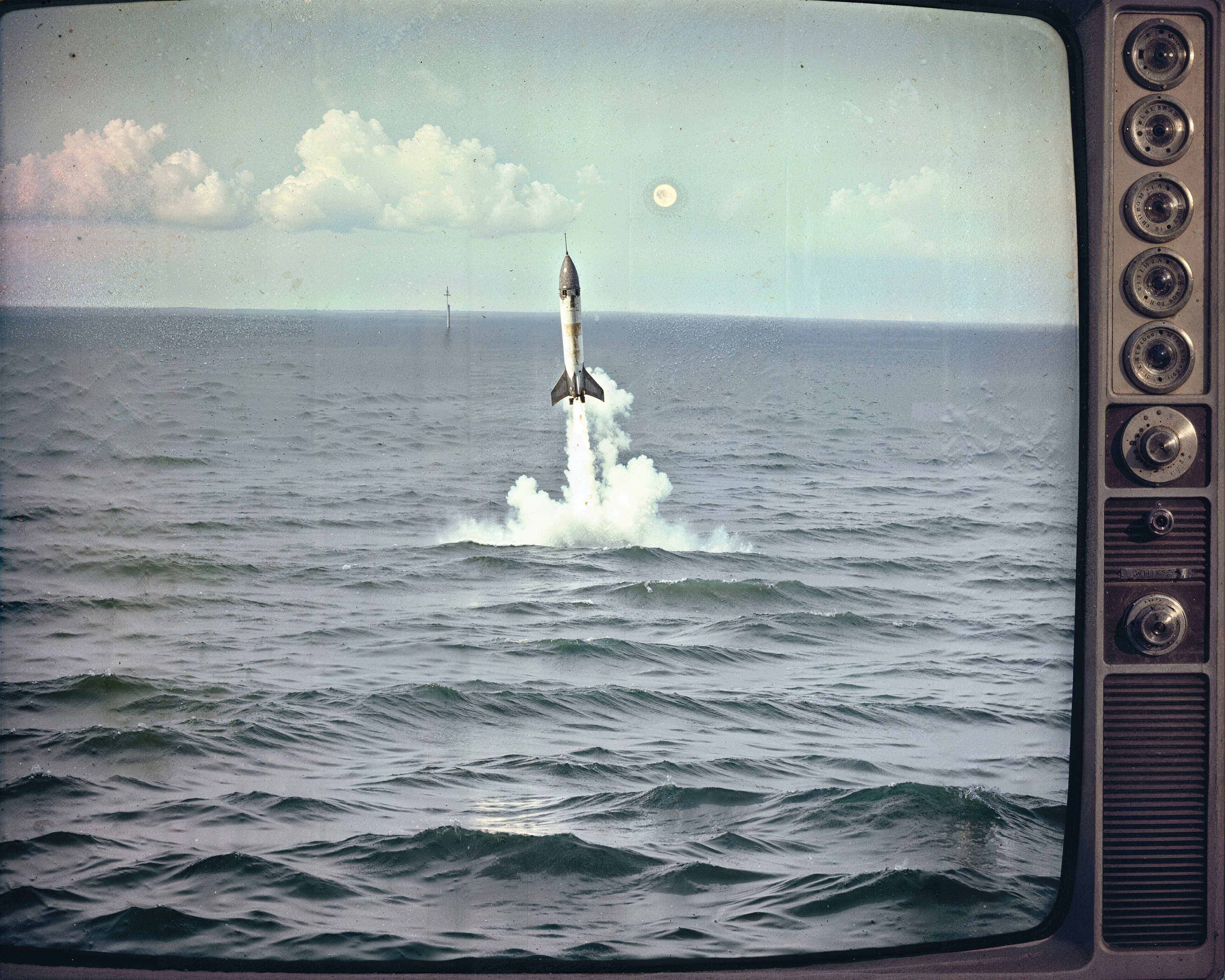 35mm #1: Mexico, Mazaltan, 1970s - Blue marlin jumping
35mm #2: USA, 1960s - A TV airing the Apollo 11 launch