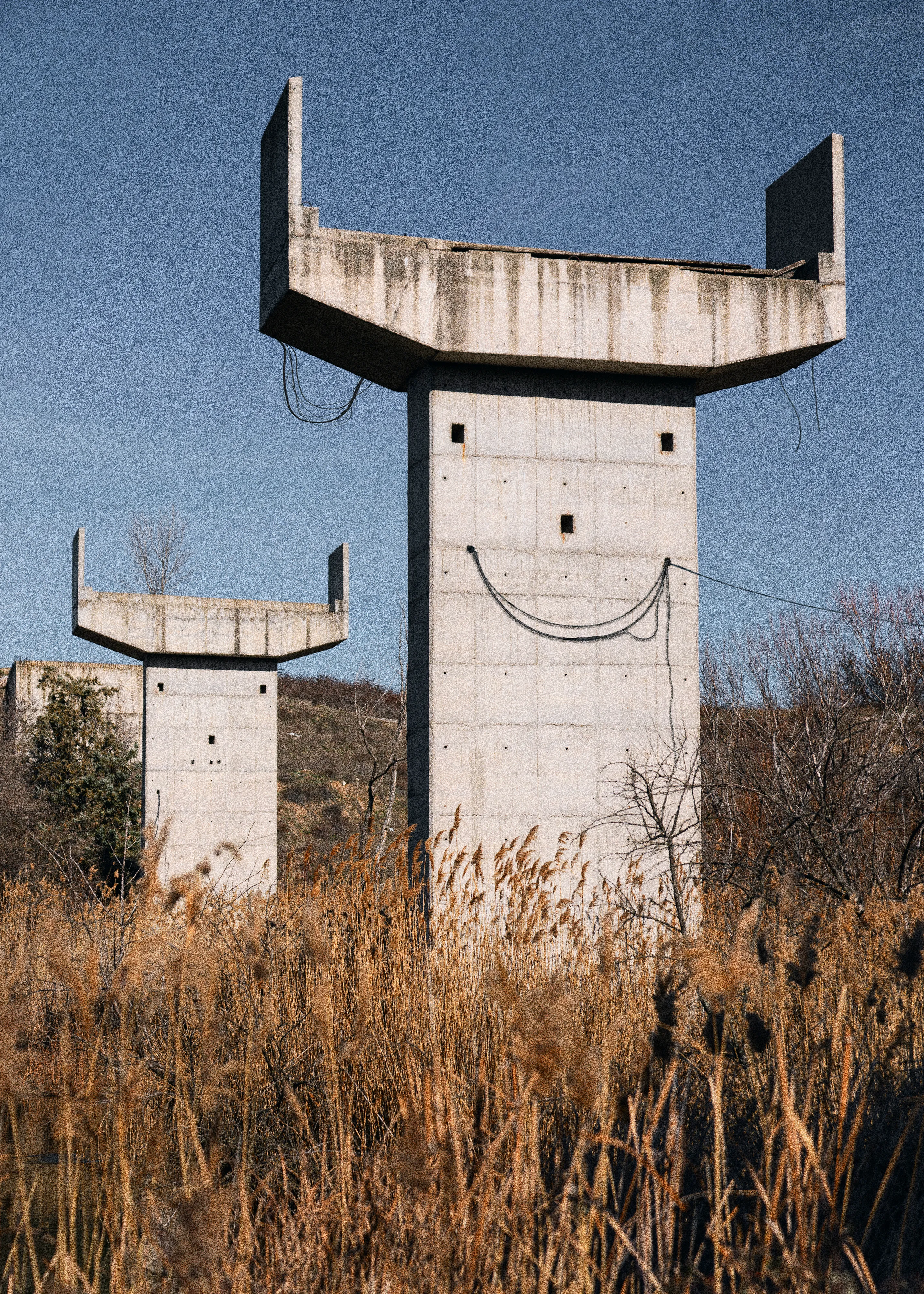 The Book of Veles 012 - Concrete foundations by Jonas Bendiksen

The contemporary photo essay from The Book of Veles, telling the story of the fake news industry in Veles, north Macedonia. The town became a global epicenter for fake news production in during the Trump-Hilary election of 2016. After being published as a successful photo book in 2021, a mysterious social media persona named Chloe Miskin revealed that the entire project was a forgery: all the people and subjects in the book are computer-generated 3D models which Bendiksen had posed and inserted into empty backgrounds.

Edition: 1 of 1

Fellowship Studio