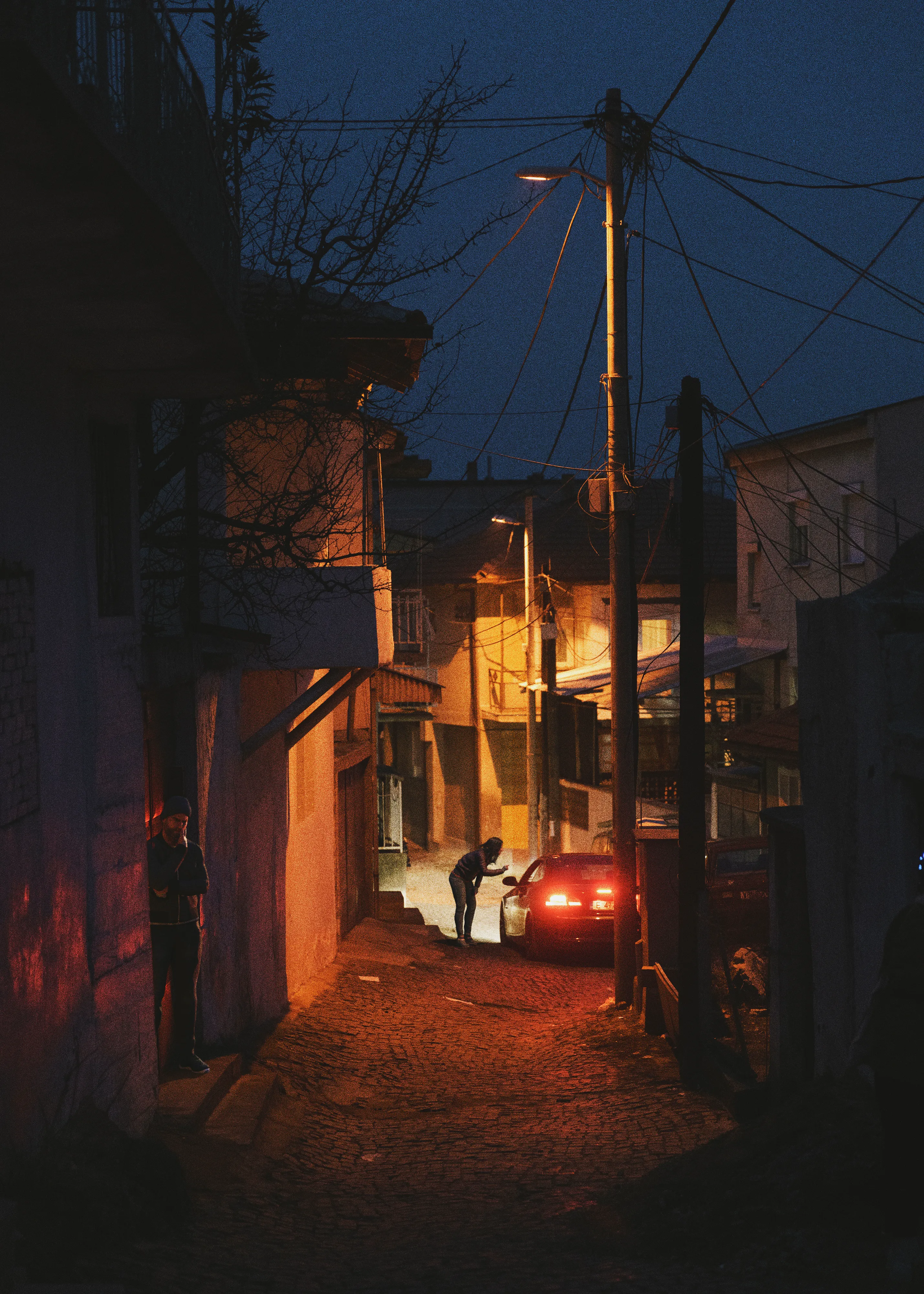 The Book of Veles 021 - Evening streetscene by Jonas Bendiksen

The contemporary photo essay from The Book of Veles, telling the story of the fake news industry in Veles, north Macedonia. The town became a global epicenter for fake news production in during the Trump-Hilary election of 2016. After being published as a successful photo book in 2021, a mysterious social media persona named Chloe Miskin revealed that the entire project was a forgery: all the people and subjects in the book are computer-generated 3D models which Bendiksen had posed and inserted into empty backgrounds.

Edition: 1 of 1

Fellowship Studio