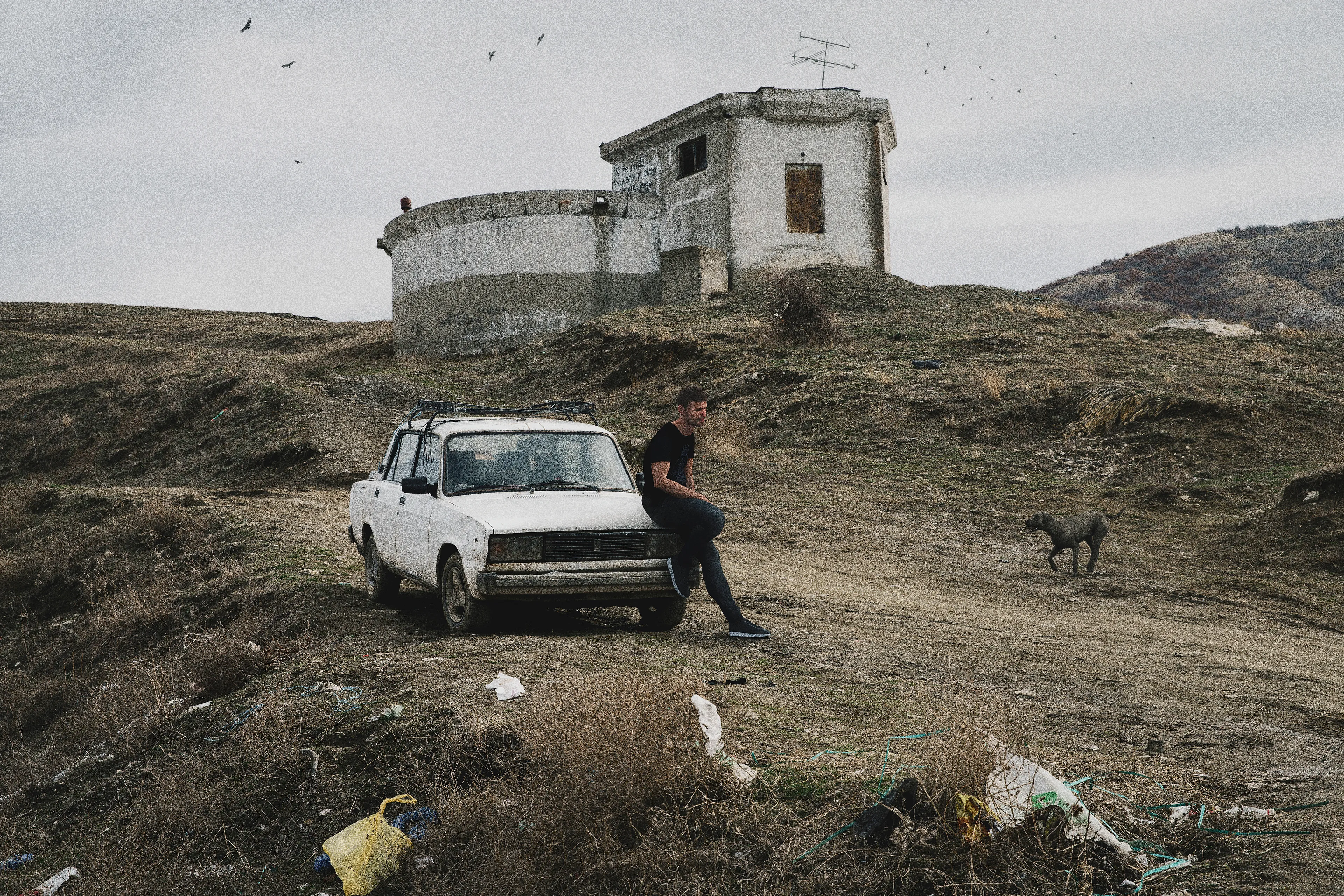 The Book of Veles 018 - Konstantin by Jonas Bendiksen

The contemporary photo essay from The Book of Veles, telling the story of the fake news industry in Veles, north Macedonia. The town became a global epicenter for fake news production in during the Trump-Hilary election of 2016. After being published as a successful photo book in 2021, a mysterious social media persona named Chloe Miskin revealed that the entire project was a forgery: all the people and subjects in the book are computer-generated 3D models which Bendiksen had posed and inserted into empty backgrounds.

Edition: 1 of 1

Fellowship Studio