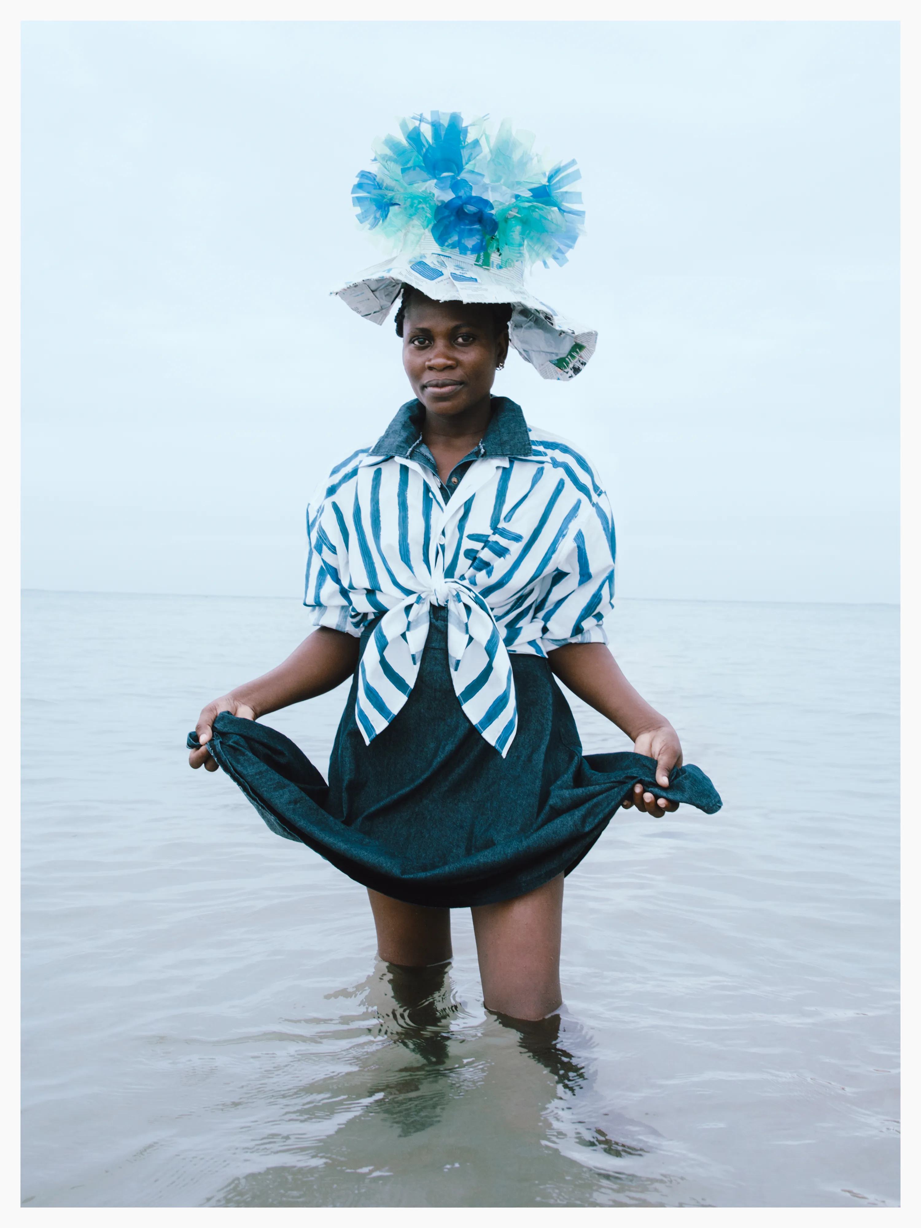 Priscillah’s hat is made of salvaged milk carton labels.

Photographed by me, styled by Louise Ford