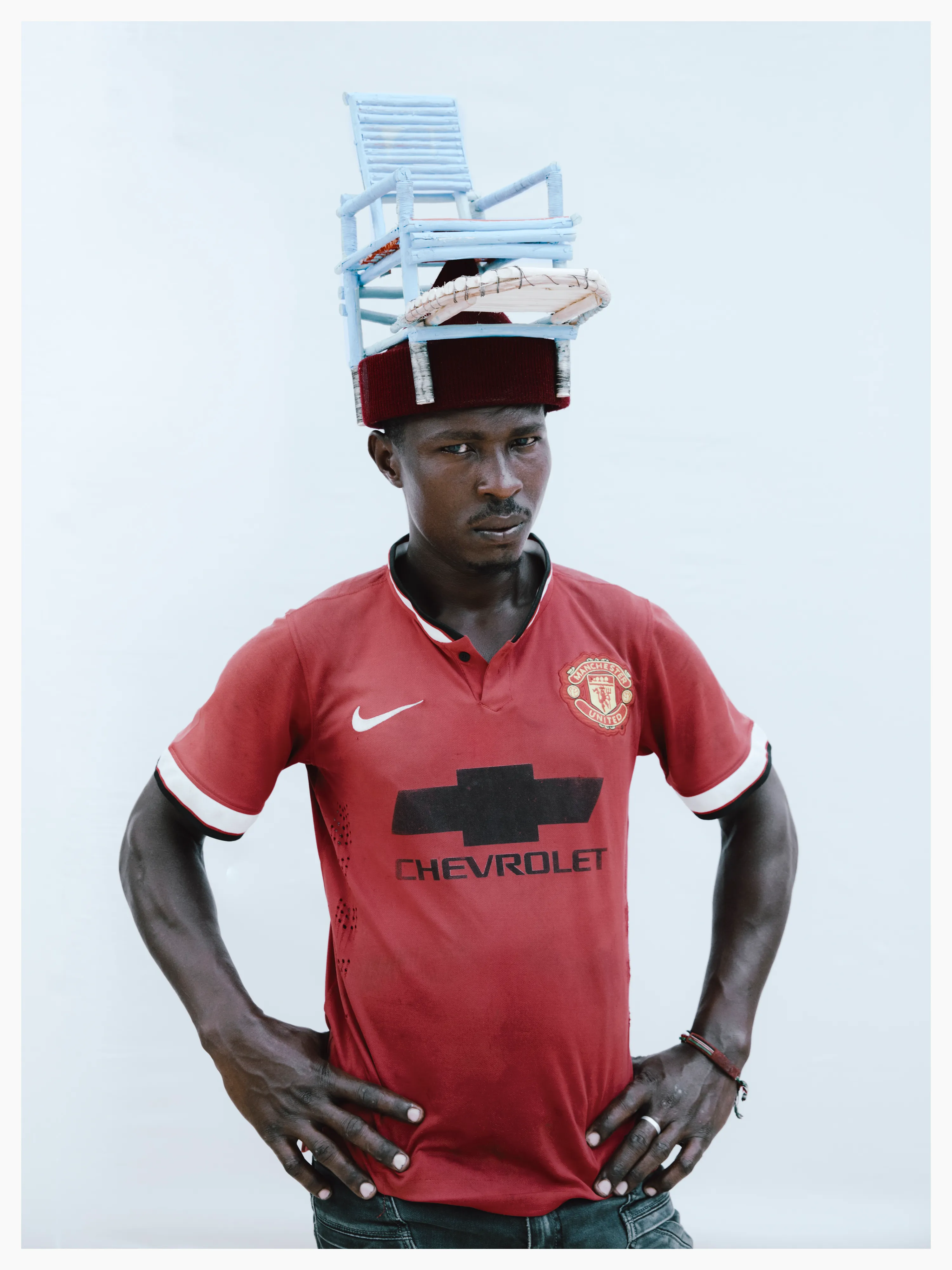 Suleiman was seeking inspiration when he realised he was sitting on a chair, so, he made a chair hat.

Photographed by me, styled by Louise Ford
