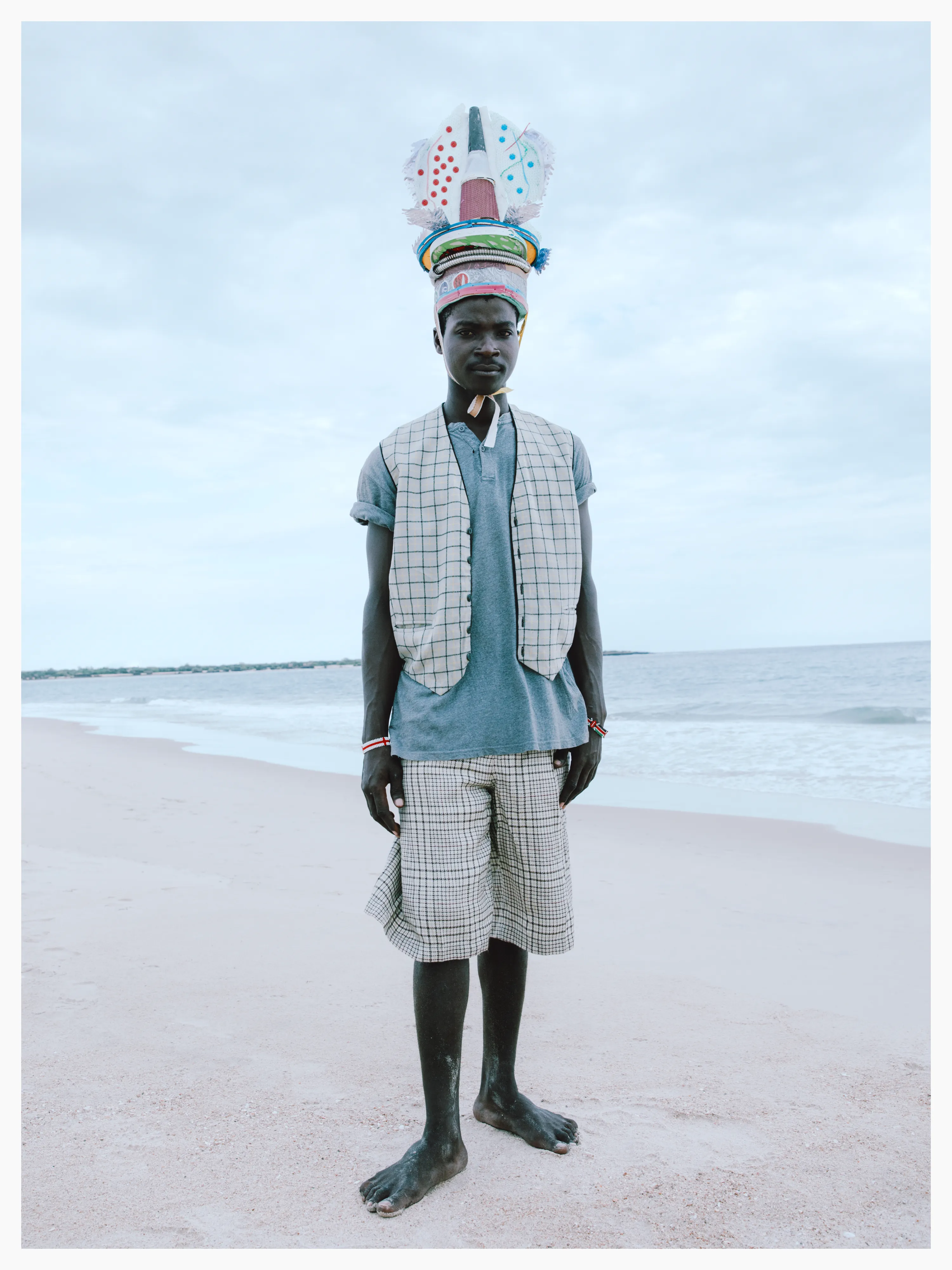 Michael wears a hat made by Mohamed Omar, aka Mohamed Dow.

Photographed by me, styled by Louise Ford