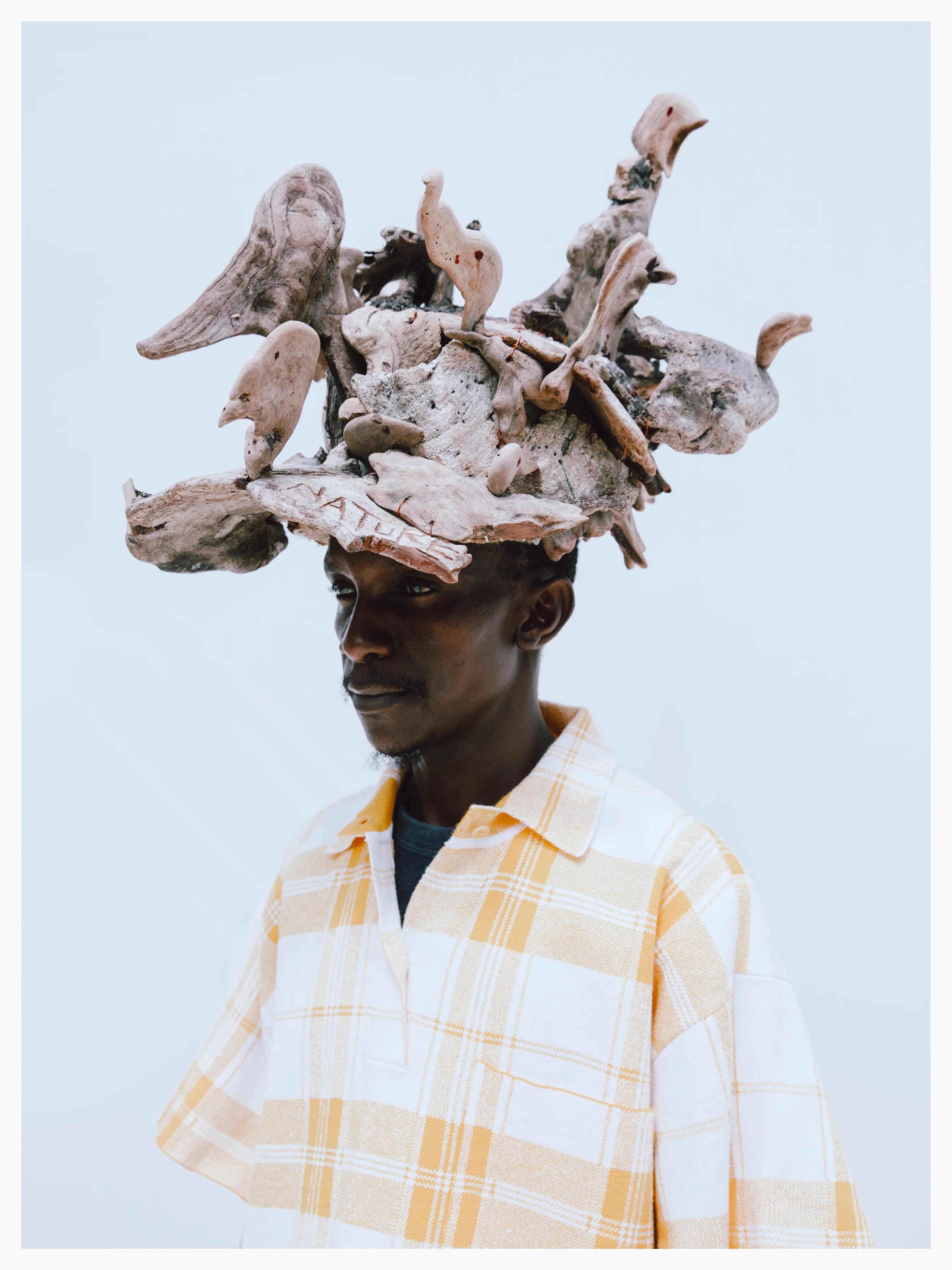 Sammy’s hat is made out of collected driftwood.

Photographed by me, styled by Louise Ford
