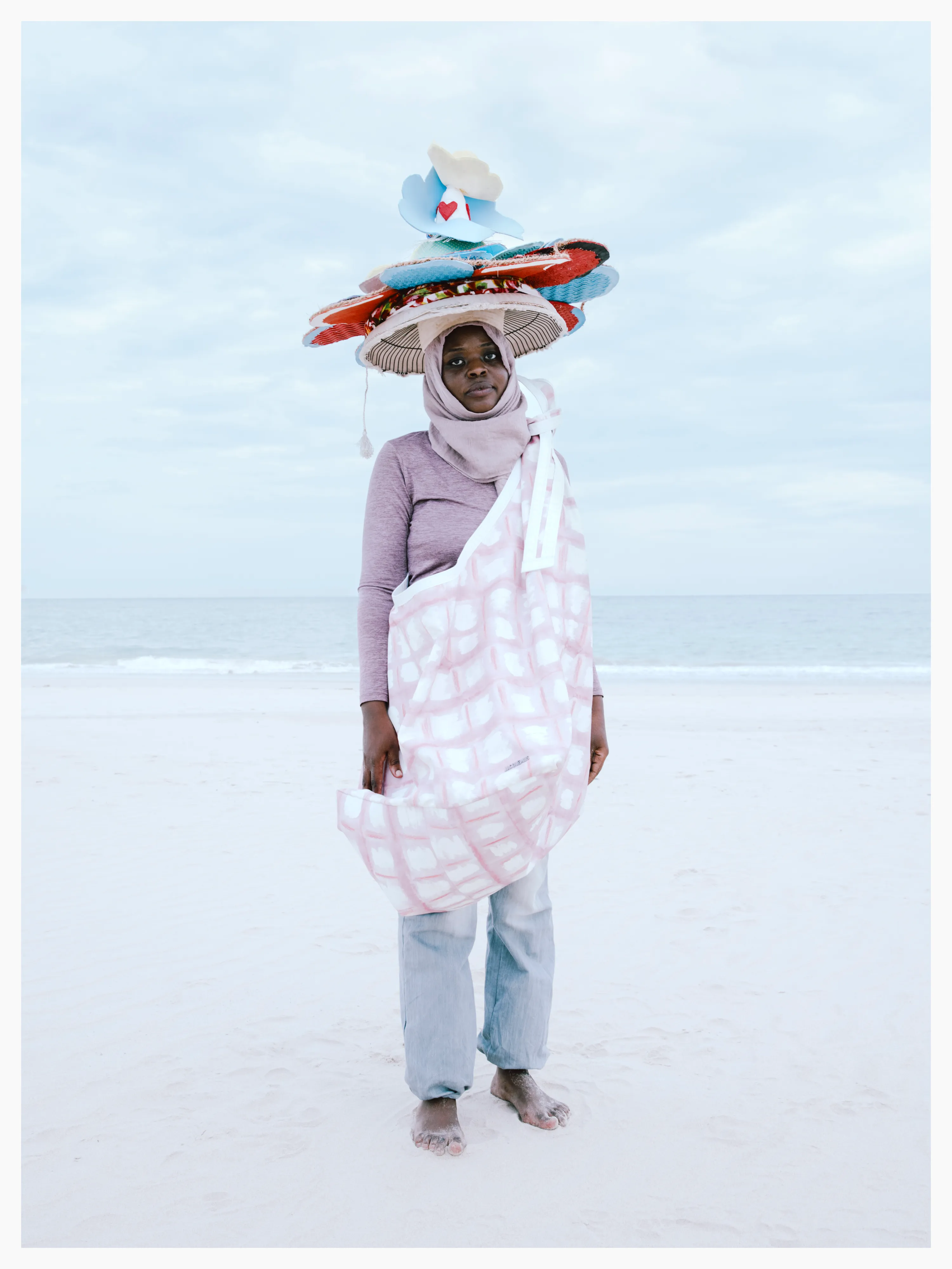 Her hat re-purposes flipflop material found washed up by the ocean.

Photographed by me, styled by Louise Ford