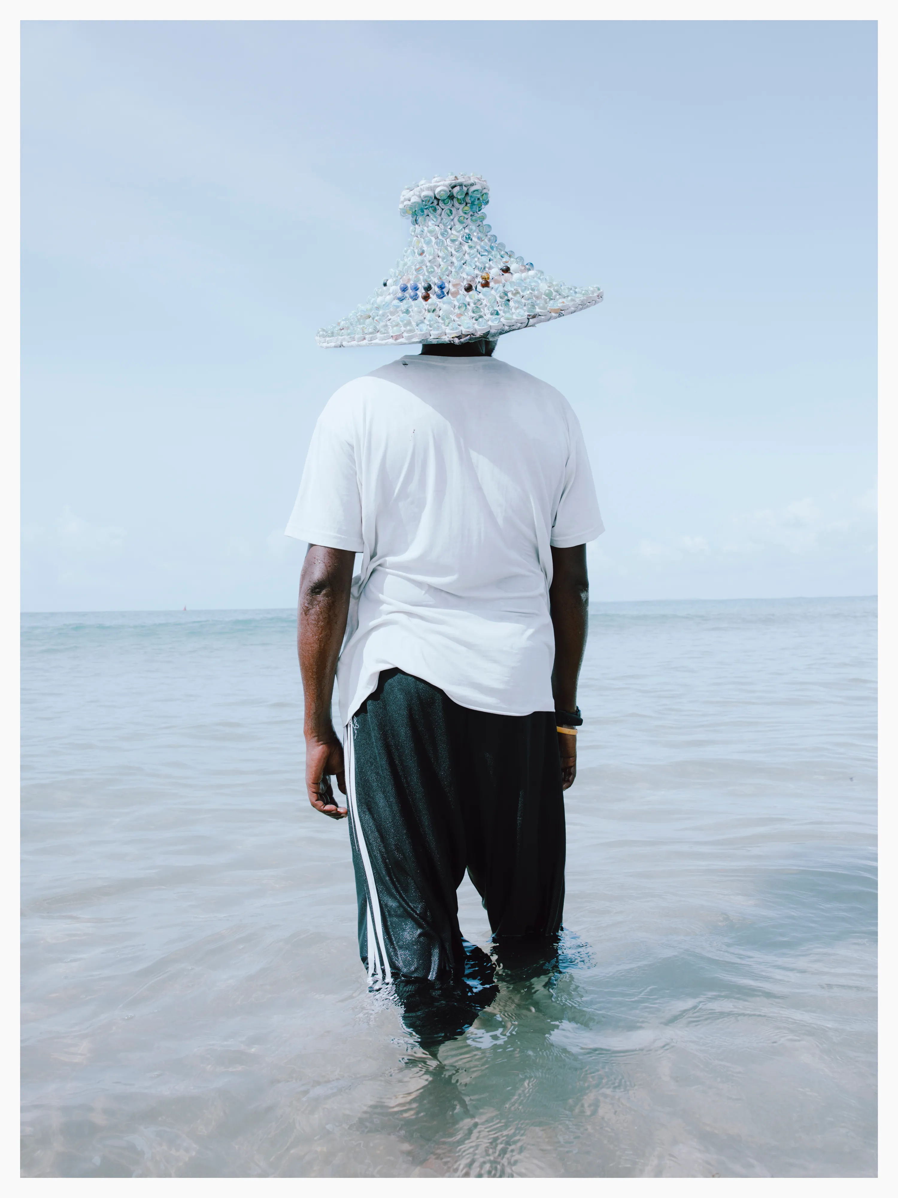 Ahmed stated the starting point for his hat was simply to create an original design. His hat is composed of marbles and newspaper.

Photographed by me, styled by Louise Ford