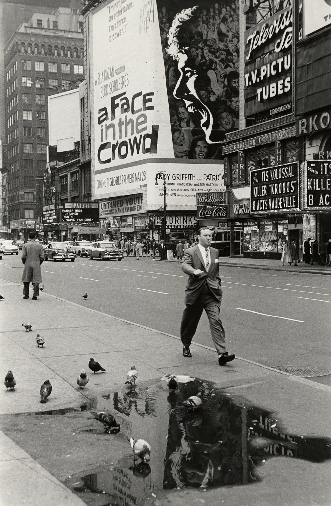 Assembly Curated and Bruce Silverstein Gallery present Frank Paulin’s “Masterworks,” a collection of some of the most iconic early work from the artist’s archive. “Masterworks” features photographs predominantly captured in the 1950s on the streets of New York City. Many of these early images by Paulin were featured in a 1957 solo exhibition at Helen Gee’s pioneering gallery and café, Limelight. Paulin’s work earned him great praise despite photography’s then uninitiated position in the fine art world. Prominent publications including The New York Times and The Village Voice praised Paulin’s ‘humor and compassion’ as well as his uncanny ability to perceive irony and record what they referred to as ‘poetic accidents.’ Paulin was a freelance fashion illustrator by day, but took to the streets in his free time to document subjects from all walks of life set against the stunning visual framework of advertisements, neon signs, and reflective store windows. This collection of well-known work recalls a distinct moment in American history, a moment captured with a passionate vision that keeps us looking.

Rediscovered in his eighth decade, Frank Paulin (b. 1926) is renowned for uniquely documenting fleeting human moments of humor and poetry, often against the backdrop of gritty urban scenes. His iconic work is in numerous collections including the MoMA, the Whitney Museum of American Art, and Yale University Art Gallery.