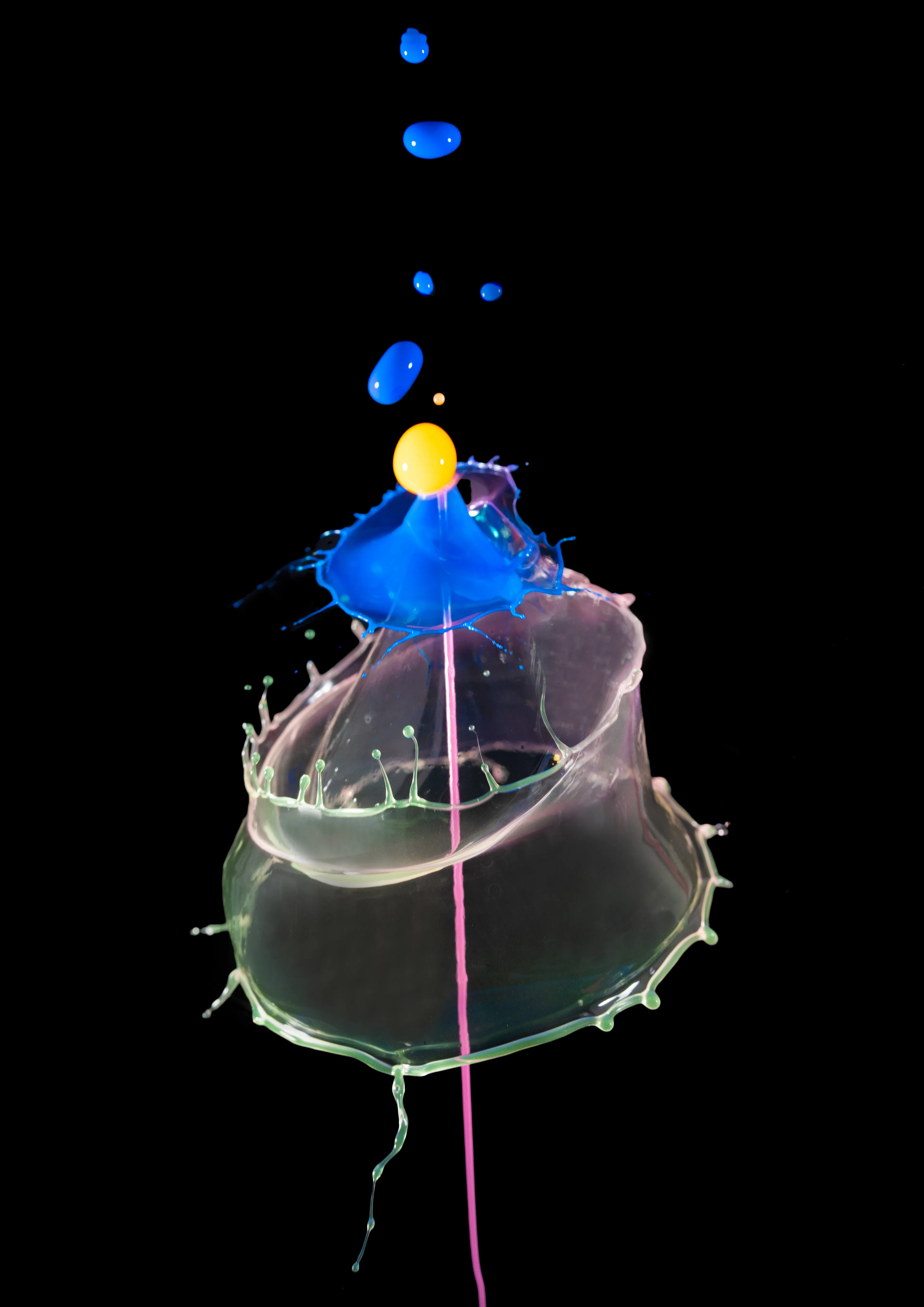 Liquid Sculpture - using high speed photography I spend my time working with a macro lens capturing the surreal impact of water drops colliding. The droplets exhibit a natural beauty of which I just adore exploring.

With this piece I am using the technique of compressed air to push water jet up to collide with water drops falling from above. Each and every output from this is 100% unique, this is why I love it so much.  It doesn’t matter how consistent my settings are, every response is unique.