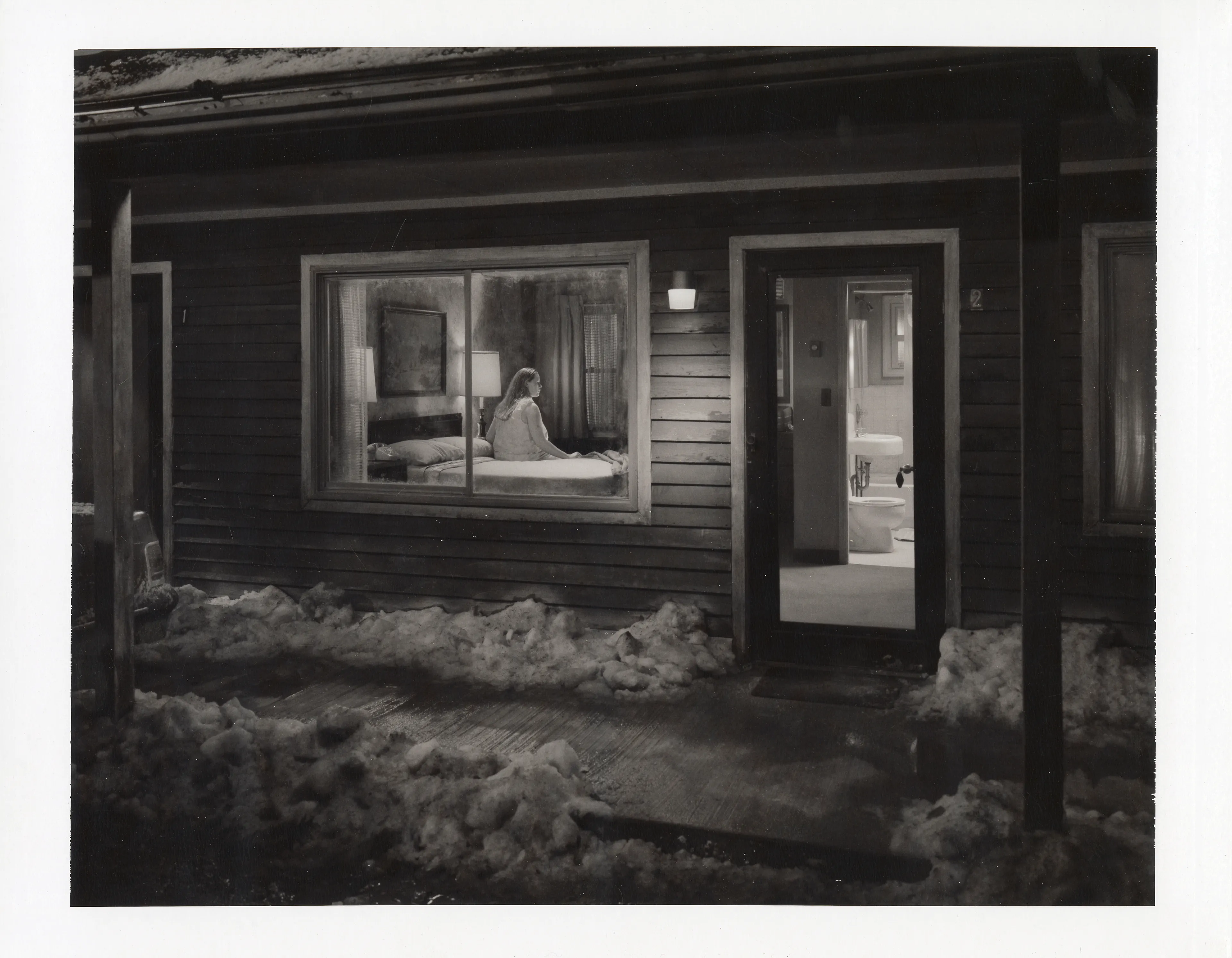 The images that comprise Crewdson’s collection, “Beneath the Roses,” take place in the homes, streets, and forests of unnamed small towns. The photographs portray emotionally charged moments of seemingly ordinary individuals caught in ambiguous and often disquieting circumstances. Both epic in scale and intimate in scope, these visually breathtaking photographs blur the distinctions between cinema and photography, reality and fantasy, what has happened and what is to come.

Edition: 1 of 1