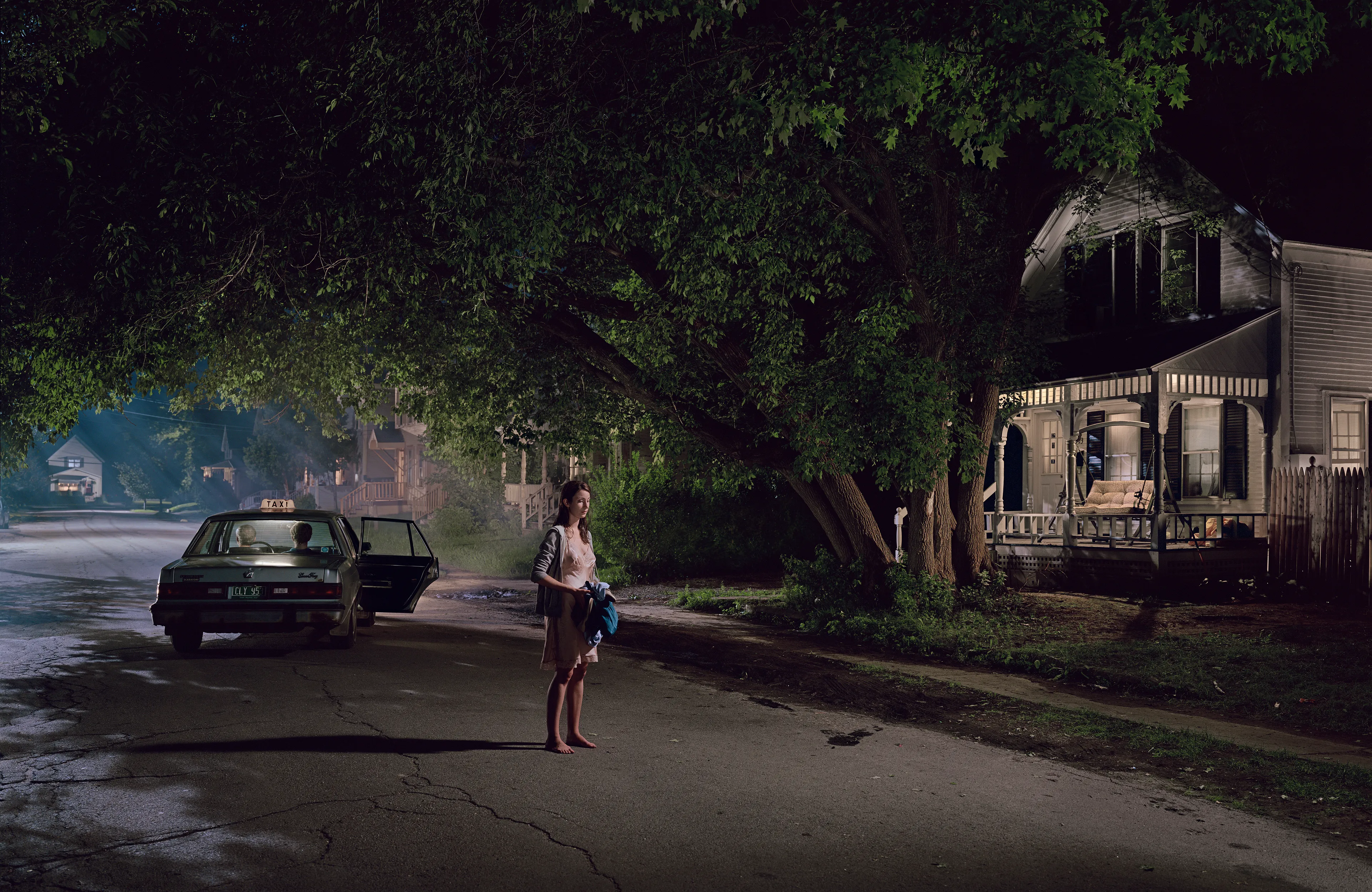 Best known for his elaborately choreographed, large-scale cinematic photographs, Gregory Crewdson is one of the most widely-known American artists working today. The images that comprise Crewdson’s series, Beneath the Roses (2003-2008), take place in the homes, streets, and forests of unnamed small towns. The photographs explore uncanny moments of contemplation within ordinary quotidien life. Made over the course of eight full scale productions spanning five years, with a full feature film-size cinematic crew, the pictures in this series are both epic in scale and intimate in scope, these visually breathtaking photographs blur the distinctions between cinema and photography, reality and fantasy, what has happened, and what is to come. The NFTs include a bundle of 10 items each, including the final artwork, and supporting process materials including 8 x 10 contact prints, black and white 8 x 10 Polaroid studies, production stills, design sketches, and other related ephemera.

Edition: 1 of 1

Set of 10. 
Each set includes 10 images: the final version and 9 supporting images.