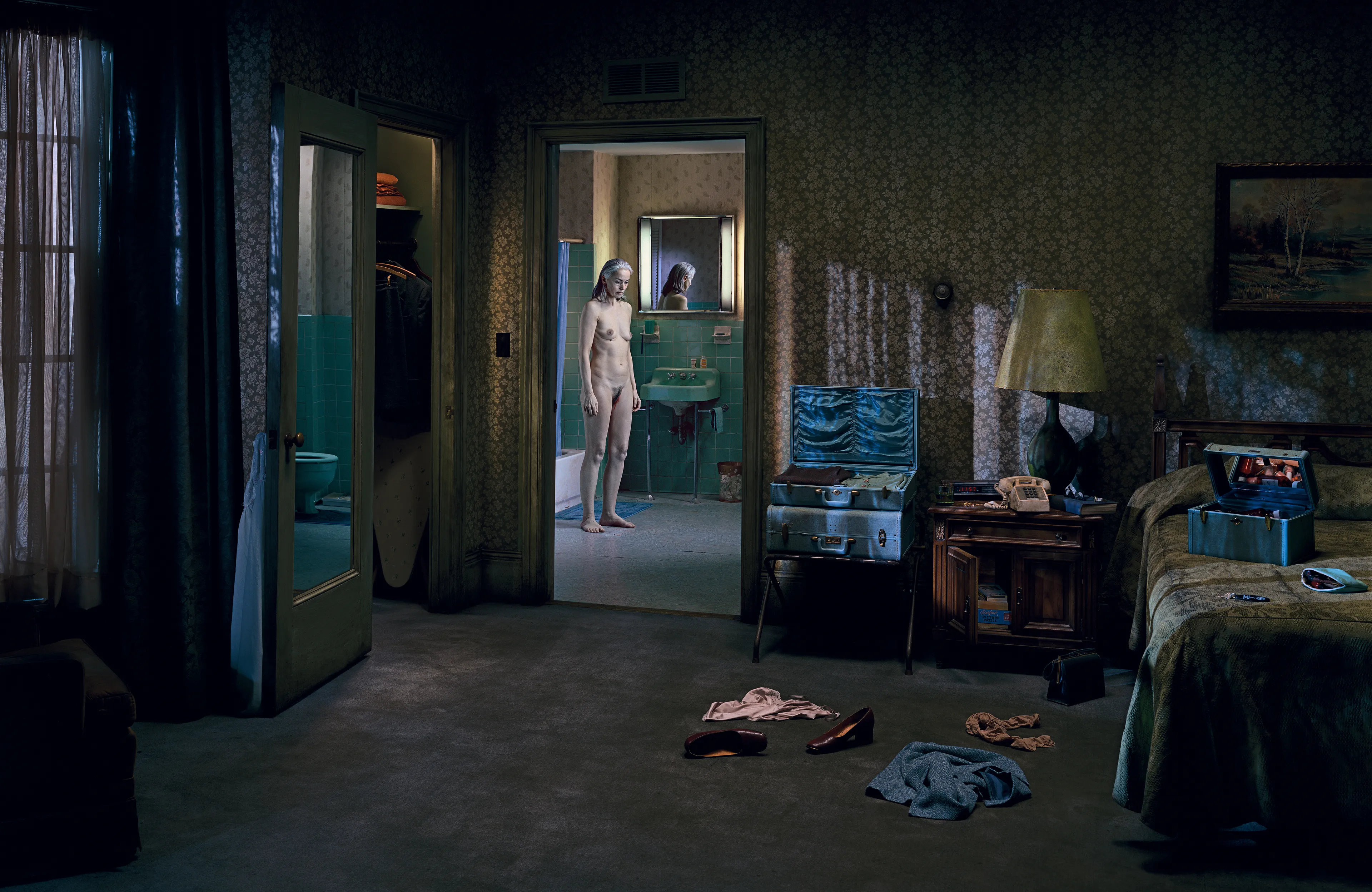 Best known for his elaborately choreographed, large-scale cinematic photographs, Gregory Crewdson is one of the most widely-known American artists working today. The images that comprise Crewdson’s series, Beneath the Roses (2003-2008), take place in the homes, streets, and forests of unnamed small towns. The photographs explore uncanny moments of contemplation within ordinary quotidien life. Made over the course of eight full scale productions spanning five years, with a full feature film-size cinematic crew, the pictures in this series are both epic in scale and intimate in scope, these visually breathtaking photographs blur the distinctions between cinema and photography, reality and fantasy, what has happened, and what is to come. The NFTs include a bundle of 10 items each, including the final artwork, and supporting process materials including 8 x 10 contact prints, black and white 8 x 10 Polaroid studies, production stills, design sketches, and other related ephemera.

Edition: 1 of 1

Set of 10. 
Each set includes 10 images: the final version and 9 supporting images.