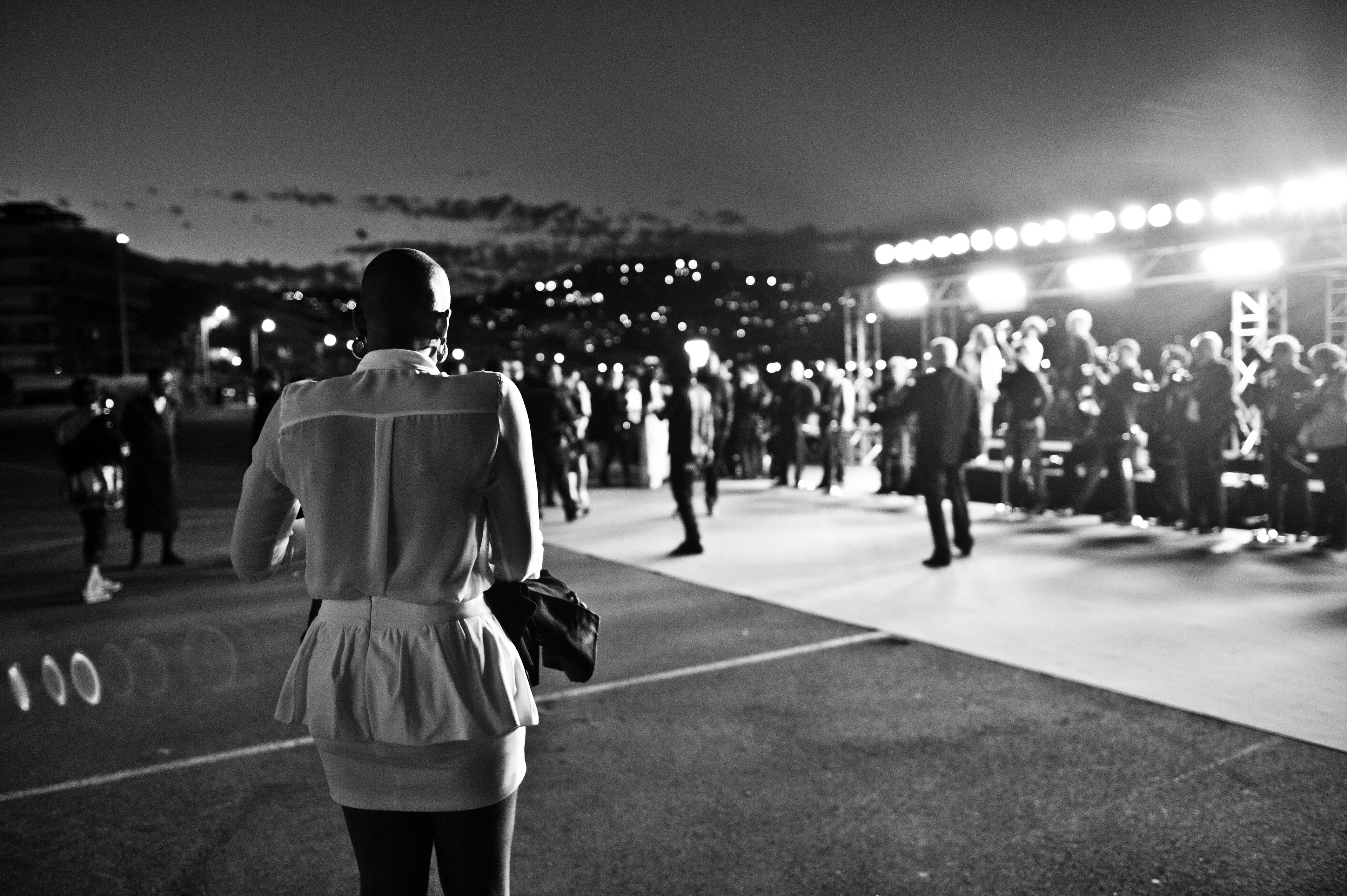 The night I found myself at the premiere of Kanye West’s short film, we were right by the sea gathering on a huge flat concrete area before going into the theatre. It was so dark that you wouldn’t have known if you were about to walk off the edge. I have no idea who this woman is but I loved watching the scene from her perspective with the mountains lit up in the distance.